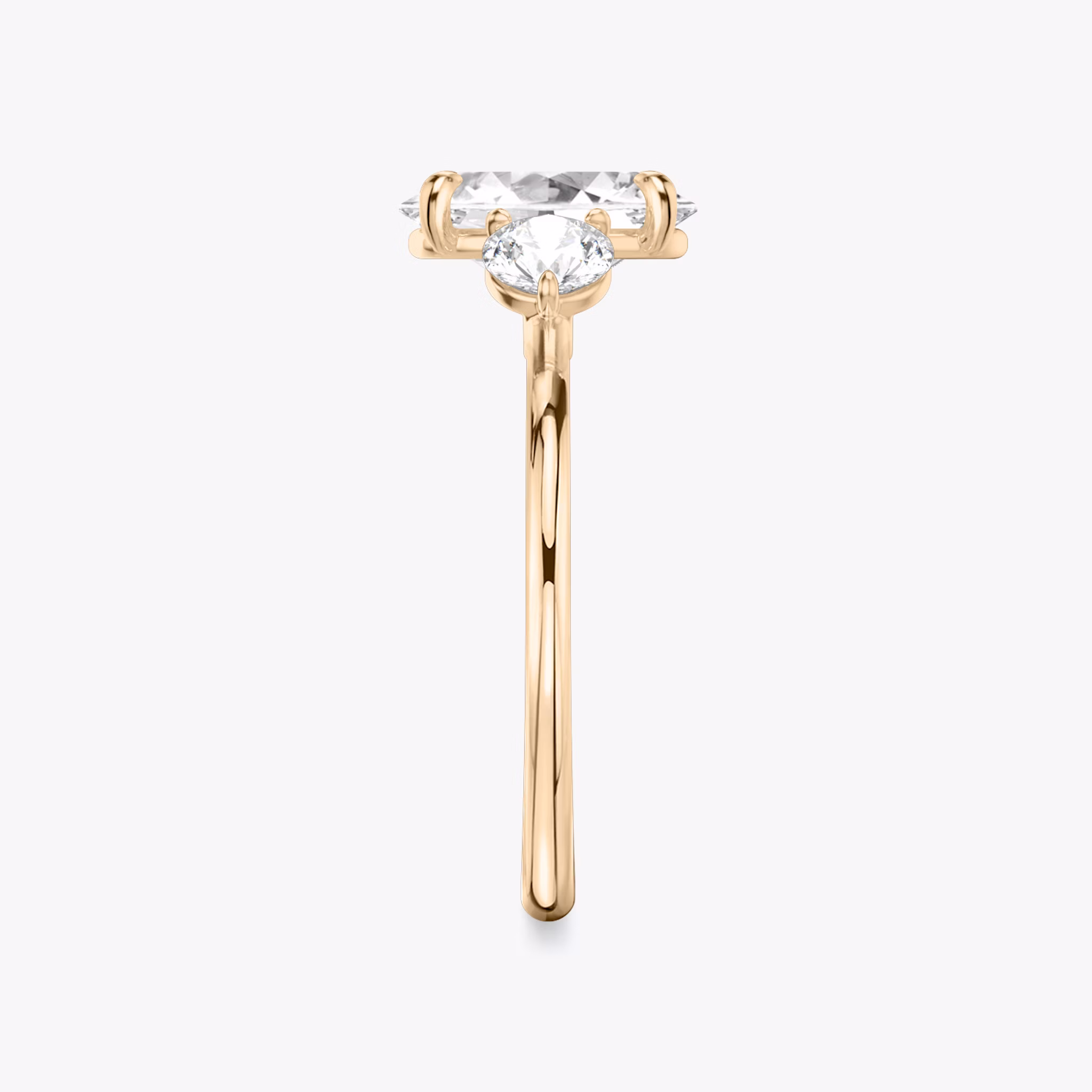 The Three Stone | Oval | 14k | Rose Gold | bandAccent: Plain | sideStoneCarat: 0.25ct | sideStoneShape: Round Brilliant | diamondOrientation: vertical | caratWeight: other