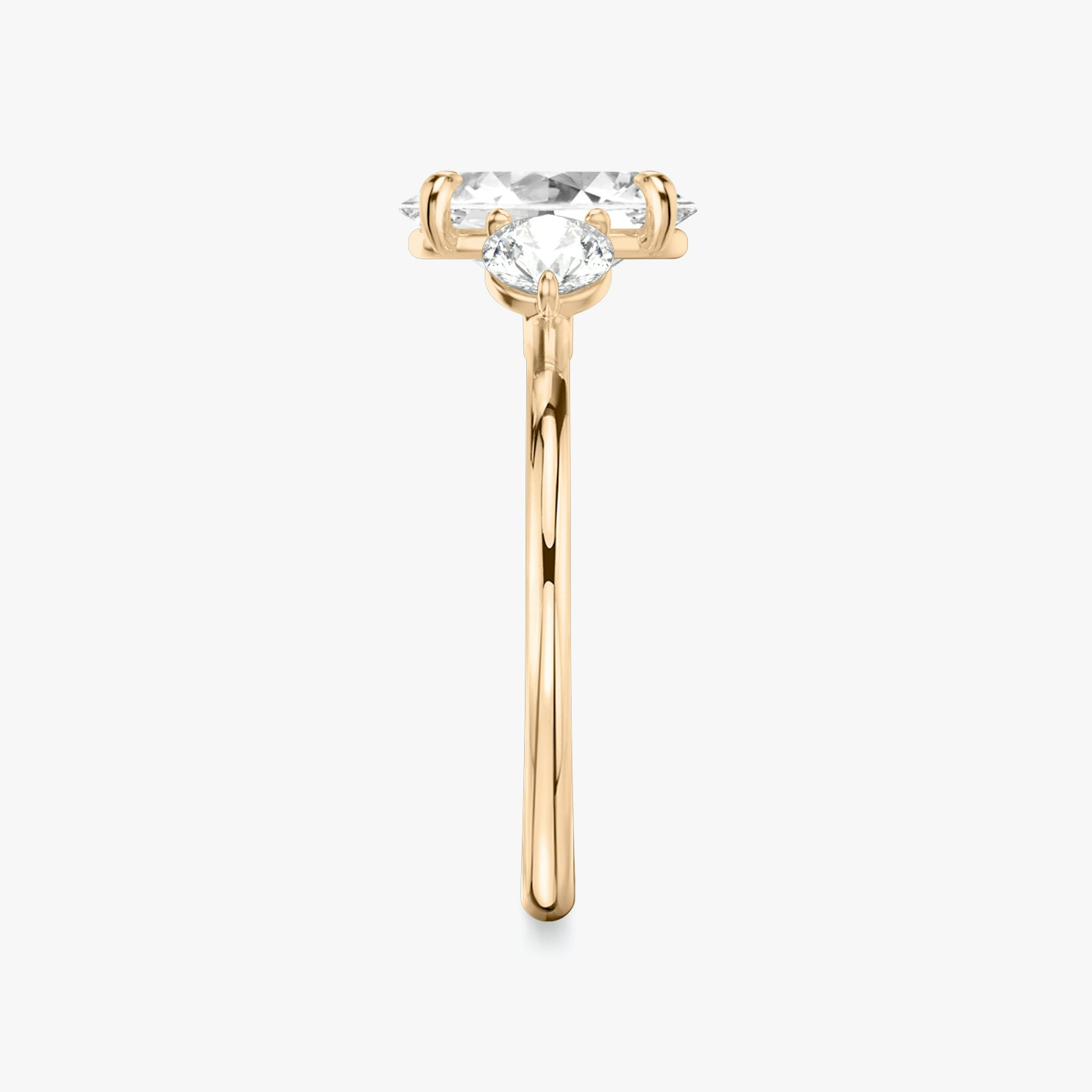 The Three Stone | Oval | 14k | Rose Gold | bandAccent: Plain | sideStoneCarat: 0.25ct | sideStoneShape: Round Brilliant | diamondOrientation: vertical | caratWeight: other