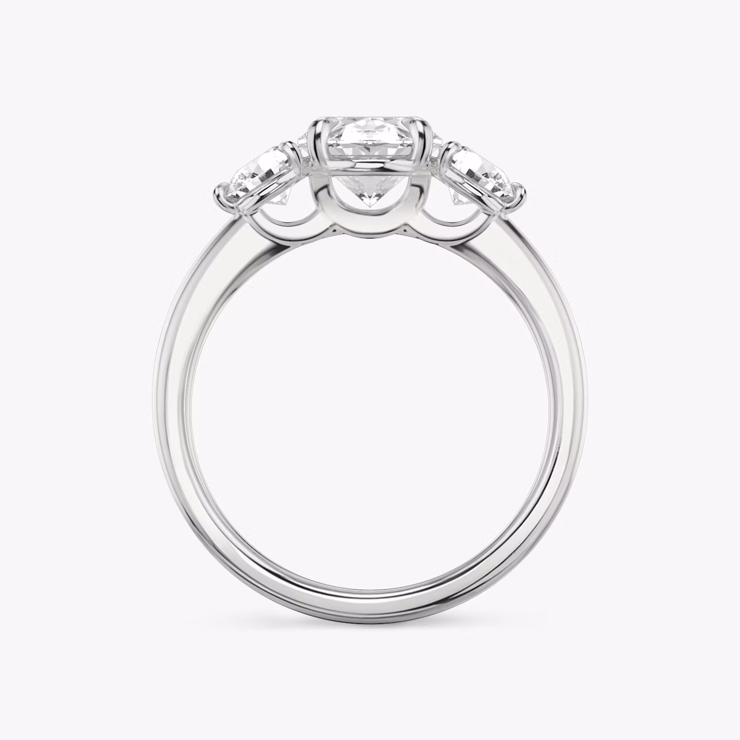The Three Stone | Oval | 18k | White Gold | bandAccent: Plain | sideStoneCarat: 0.25ct | sideStoneShape: Round Brilliant | diamondOrientation: vertical | caratWeight: other