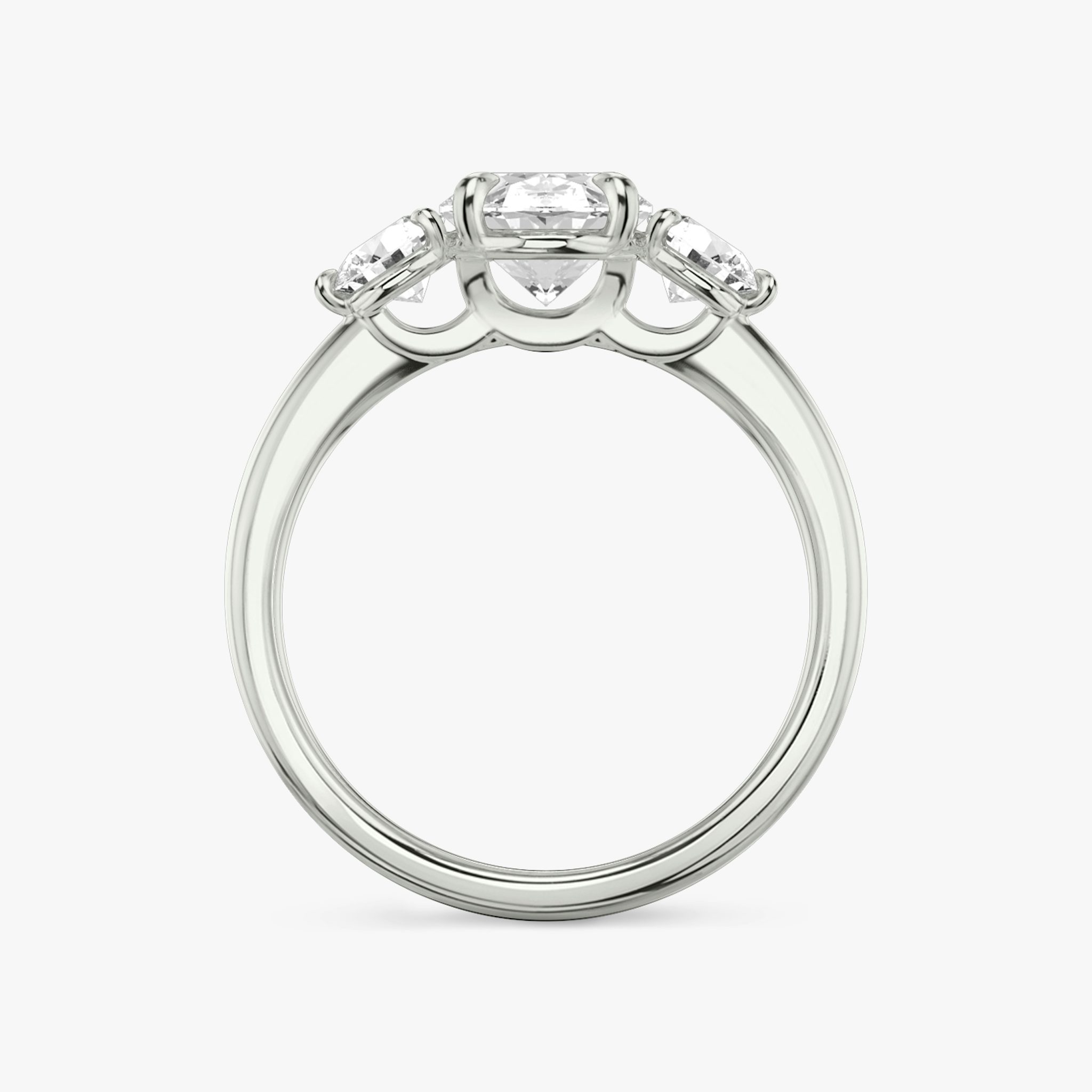 The Three Stone | Oval | 18k | White Gold | bandAccent: Plain | sideStoneCarat: 0.25ct | sideStoneShape: Round Brilliant | diamondOrientation: vertical | caratWeight: other