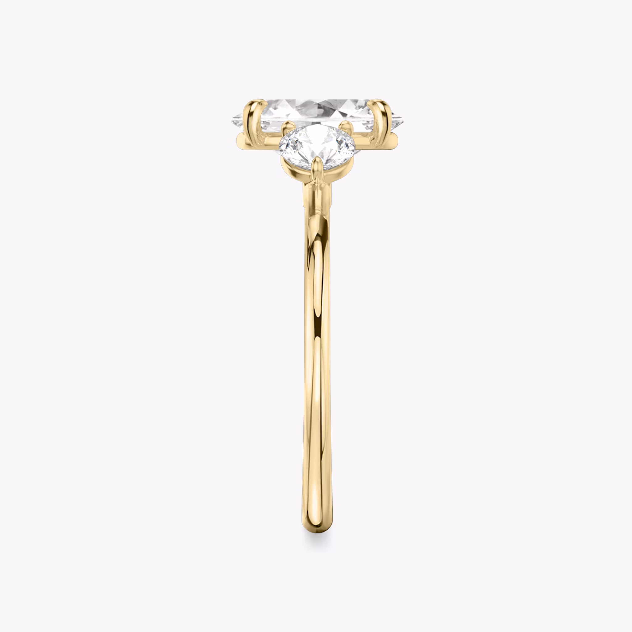 The Three Stone | Oval | 18k | Yellow Gold | bandAccent: Plain | sideStoneCarat: 0.25ct | sideStoneShape: Round Brilliant | diamondOrientation: vertical | caratWeight: other