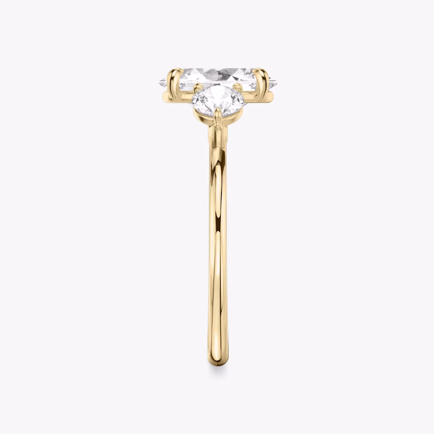 The Three Stone | Oval | 18k | Yellow Gold | bandAccent: Plain | sideStoneCarat: 0.25ct | sideStoneShape: Round Brilliant | diamondOrientation: vertical | caratWeight: other