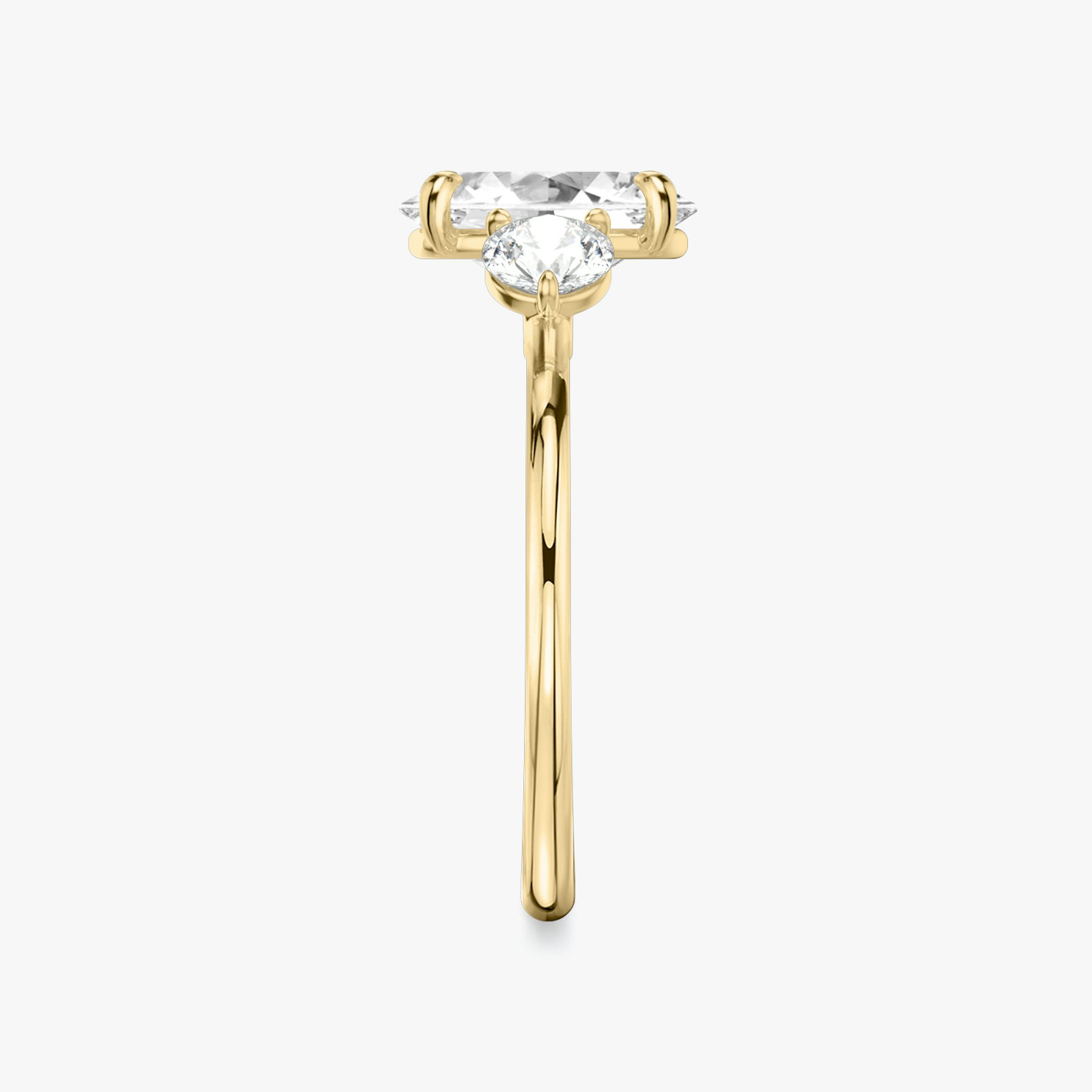 The Three Stone | Oval | 18k | Yellow Gold | bandAccent: Plain | sideStoneCarat: 0.25ct | sideStoneShape: Round Brilliant | diamondOrientation: vertical | caratWeight: other