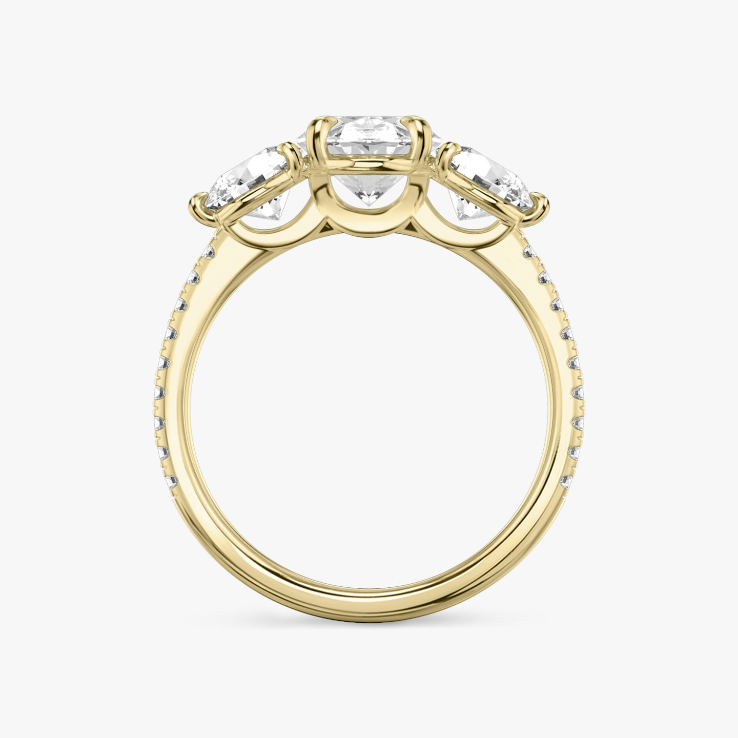 The Three Stone | Oval | 18k | Yellow Gold | bandAccent: Pavé | sideStoneCarat: 0.50ct | sideStoneShape: Round Brilliant | diamondOrientation: vertical | caratWeight: other