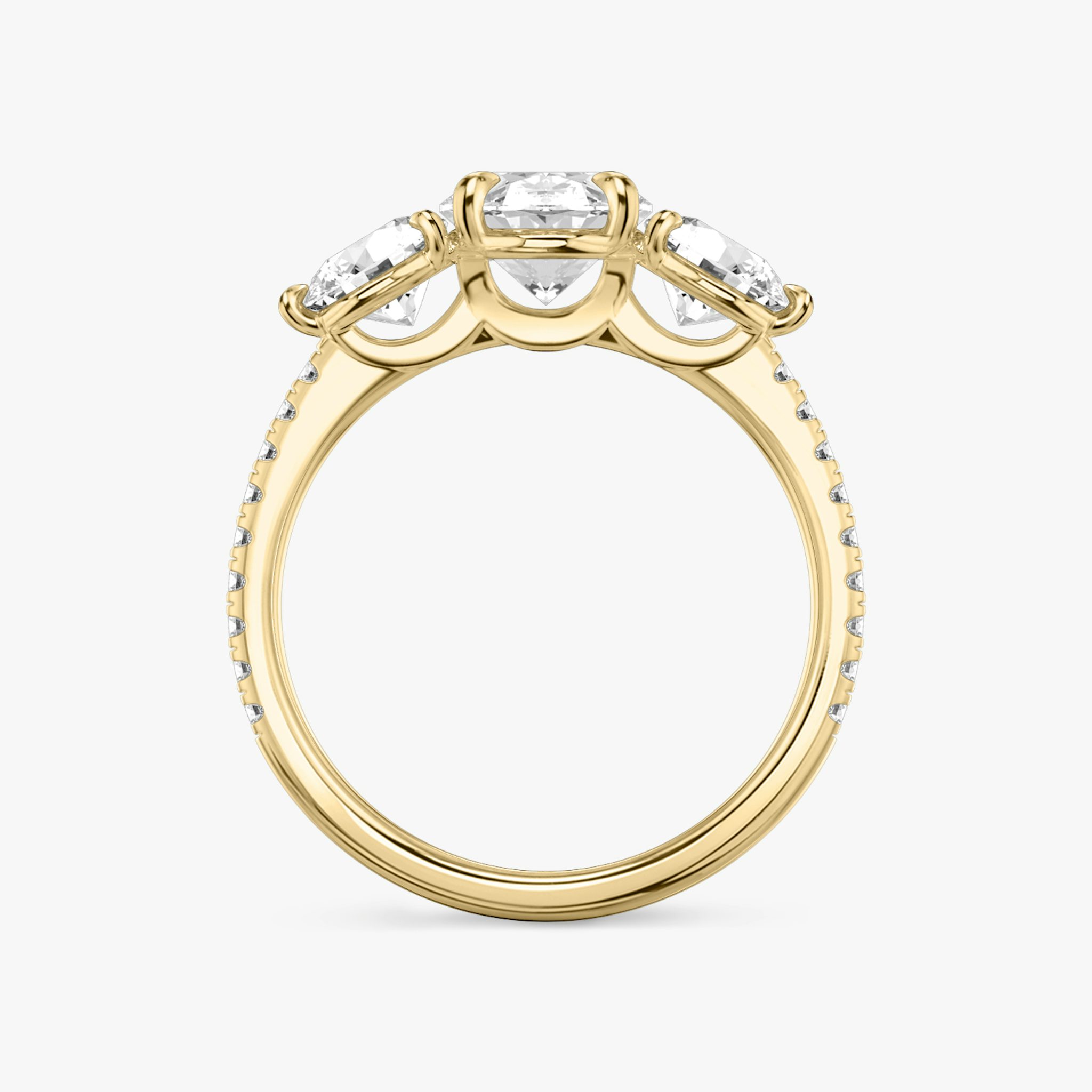The Three Stone | Oval | 18k | Yellow Gold | bandAccent: Pavé | sideStoneCarat: 0.50ct | sideStoneShape: Round Brilliant | diamondOrientation: vertical | caratWeight: other