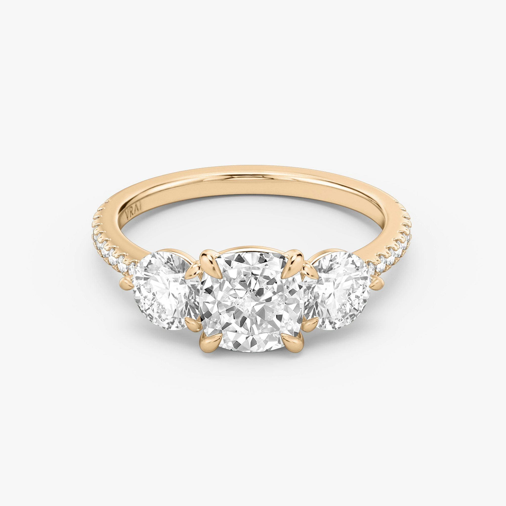 The Three Stone | Cushion | 14k | Rose Gold | bandAccent: Pavé | sideStoneCarat: 0.50ct | sideStoneShape: Round Brilliant | diamondOrientation: vertical | caratWeight: other