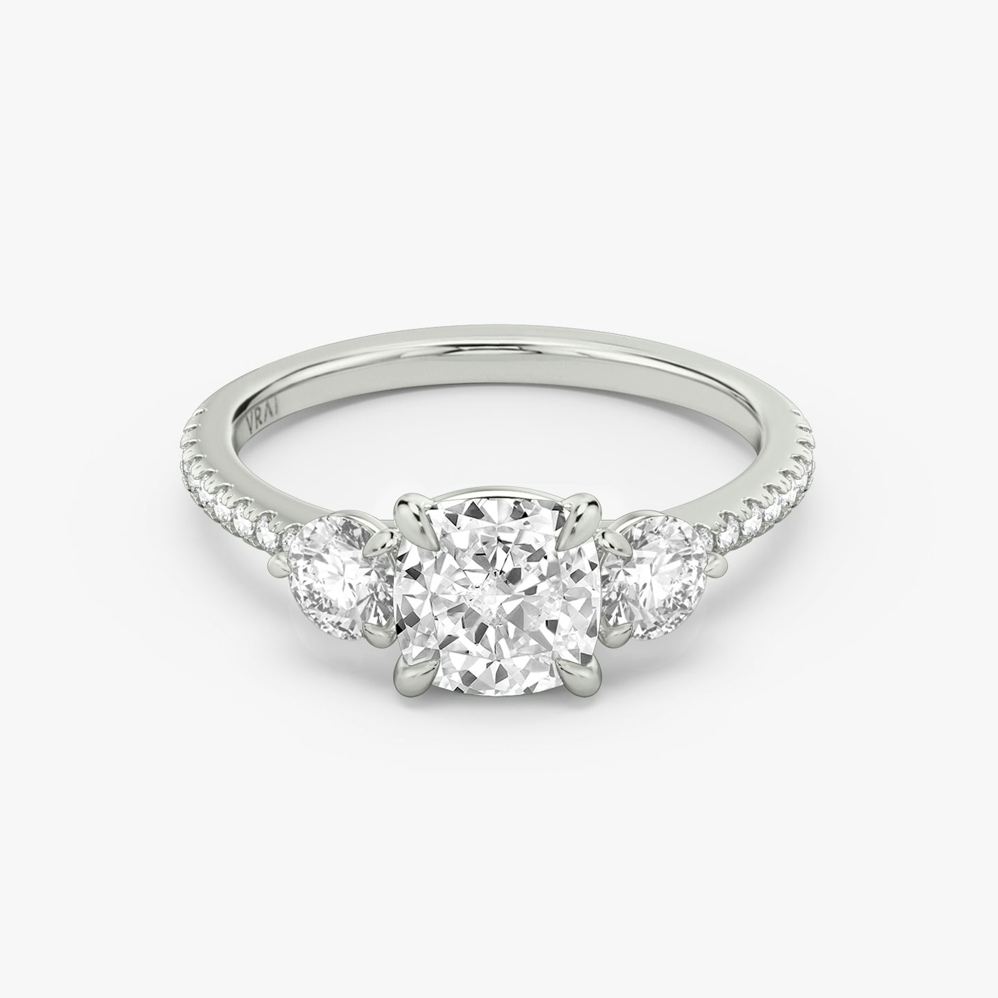 Three Stone Cushion and Round Brilliant RIng