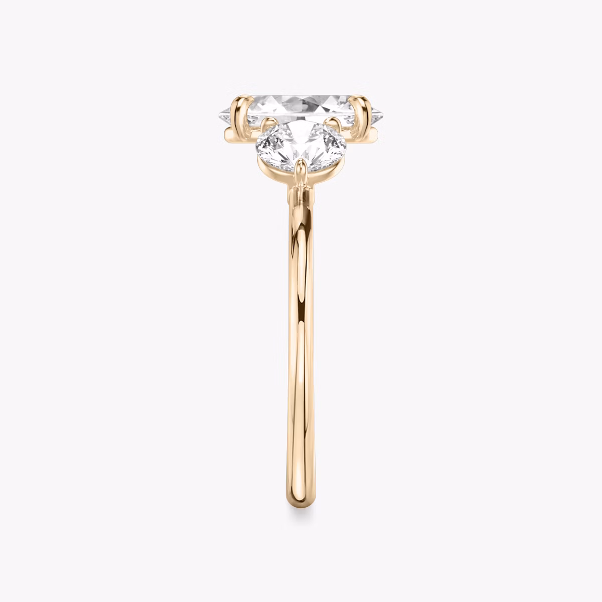 The Three Stone | Oval | 14k | Rose Gold | bandAccent: Plain | sideStoneCarat: 0.50ct | sideStoneShape: Round Brilliant | diamondOrientation: vertical | caratWeight: other