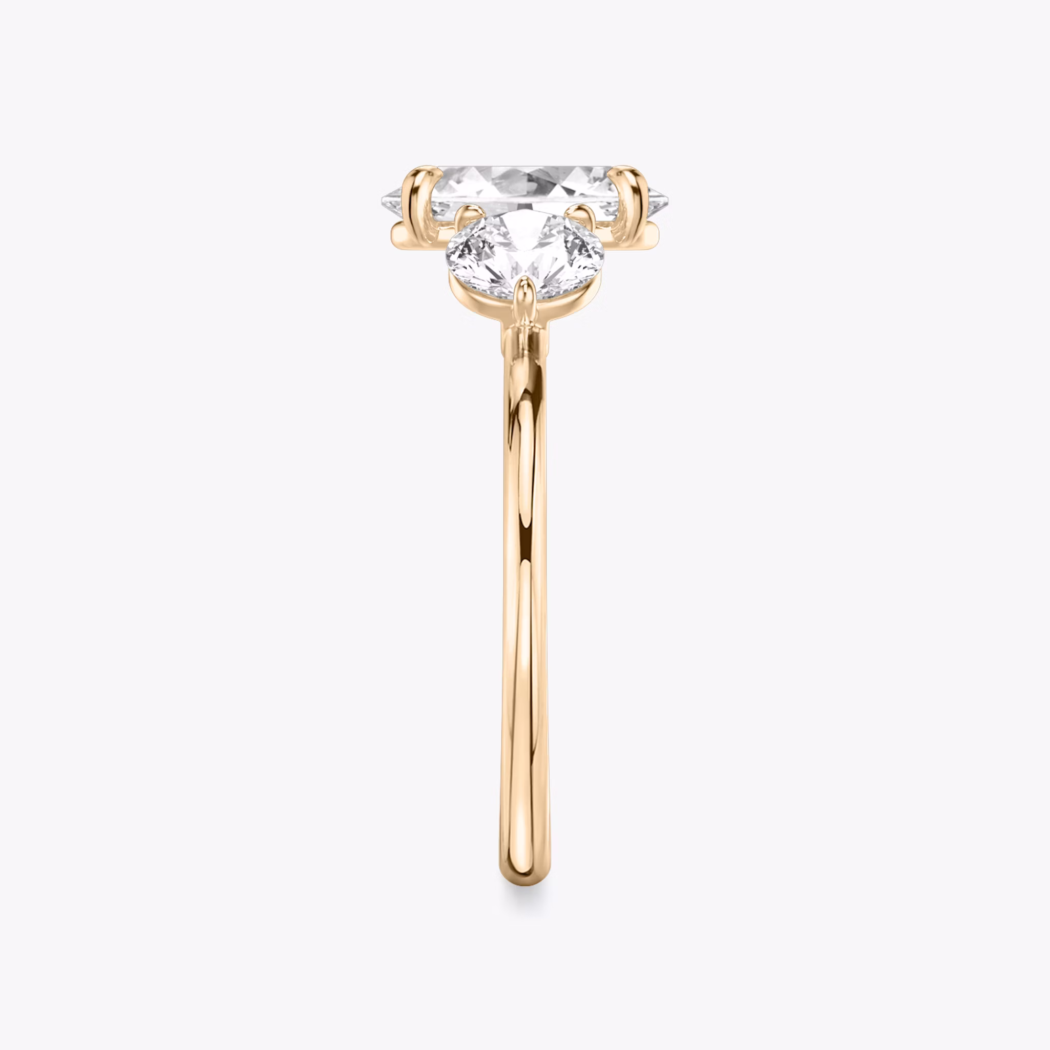 The Three Stone | Oval | 14k | Rose Gold | bandAccent: Plain | sideStoneCarat: 0.50ct | sideStoneShape: Round Brilliant | diamondOrientation: vertical | caratWeight: other