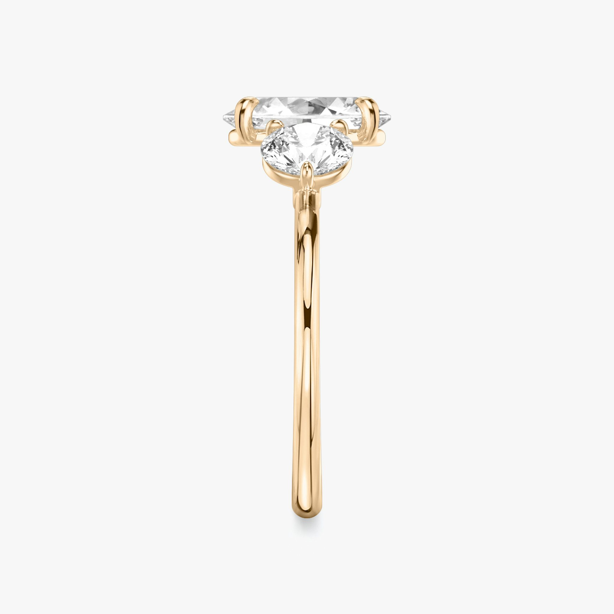 The Three Stone | Oval | 14k | Rose Gold | bandAccent: Plain | sideStoneCarat: 0.50ct | sideStoneShape: Round Brilliant | diamondOrientation: vertical | caratWeight: other