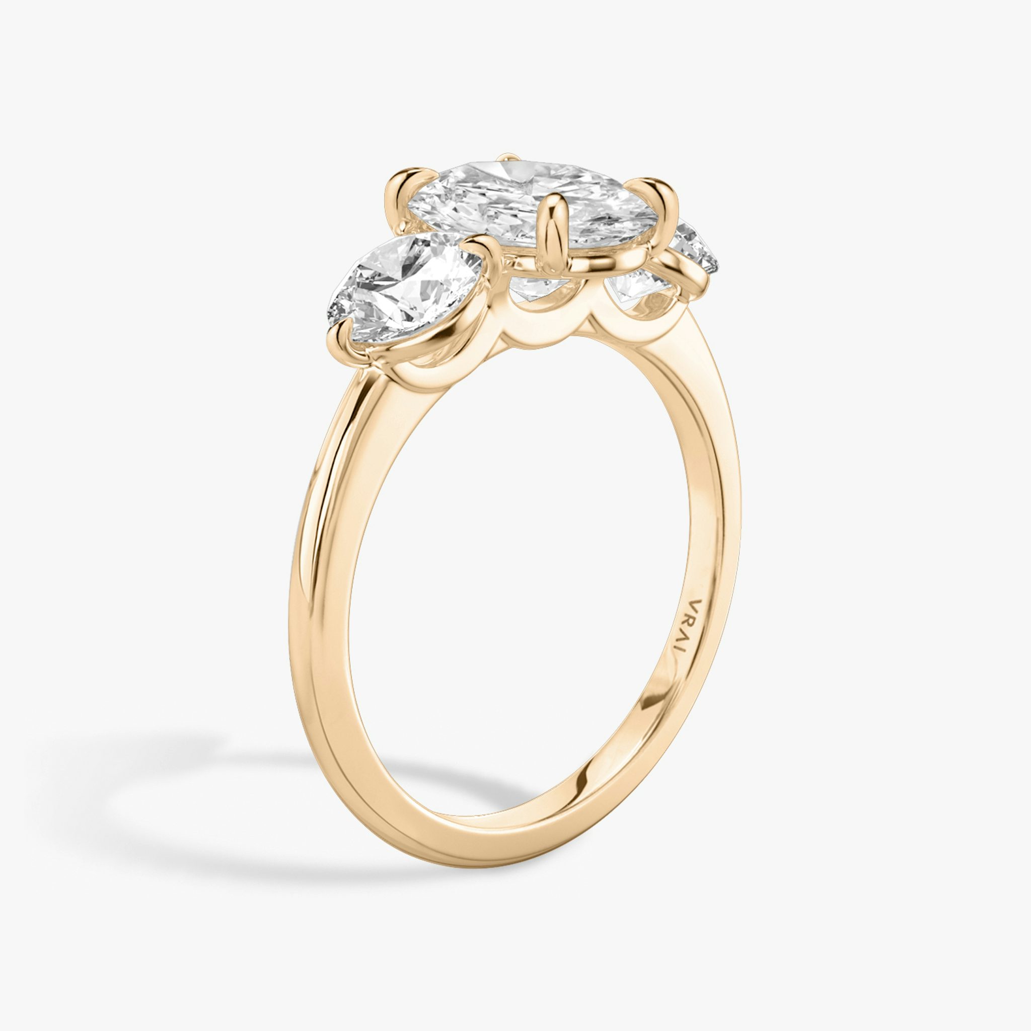 The Three Stone | Oval | 14k | Rose Gold | bandAccent: Plain | sideStoneCarat: 0.50ct | sideStoneShape: Round Brilliant | diamondOrientation: vertical | caratWeight: other