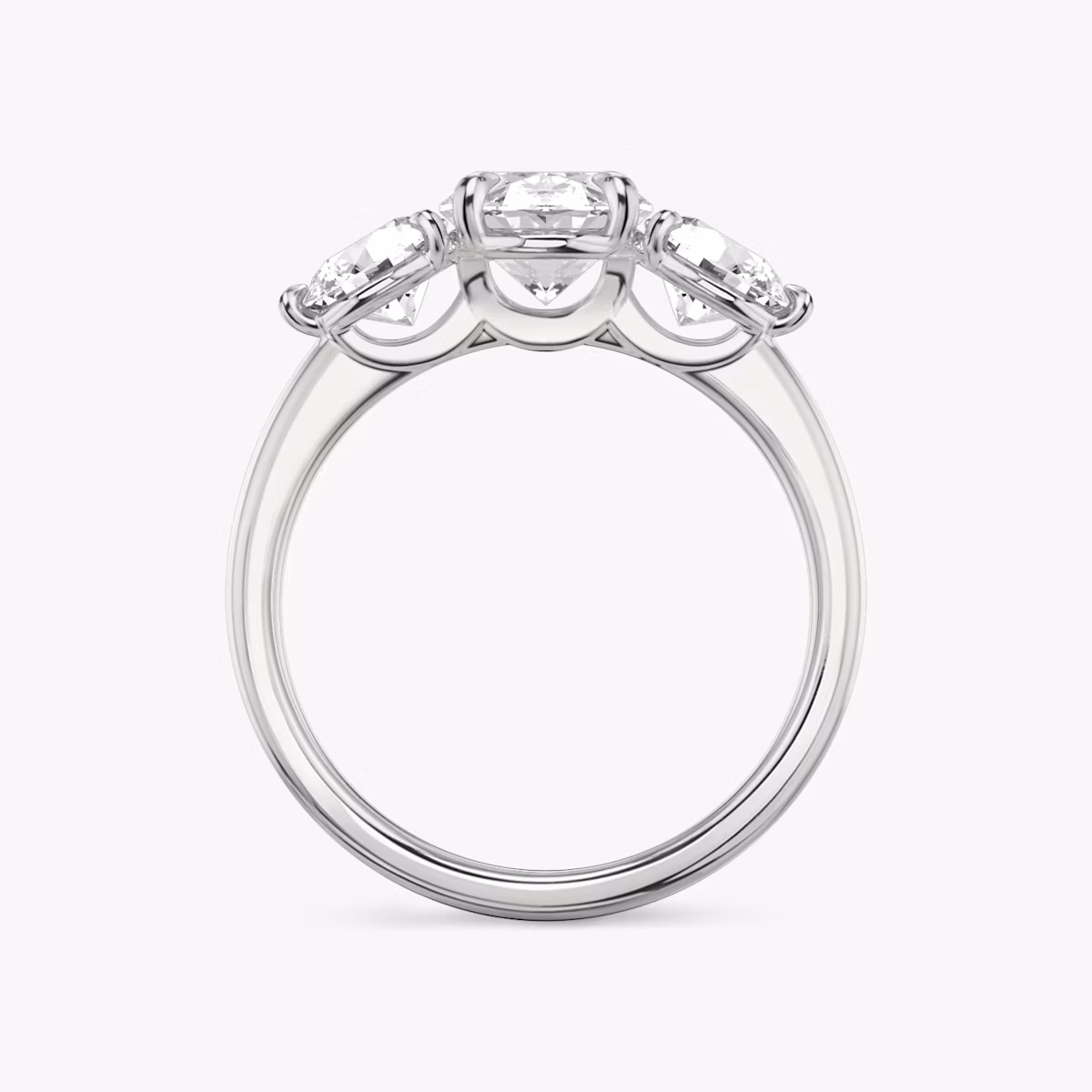 The Three Stone | Oval | Platinum | bandAccent: Plain | sideStoneCarat: 0.50ct | sideStoneShape: Round Brilliant | diamondOrientation: vertical | caratWeight: other