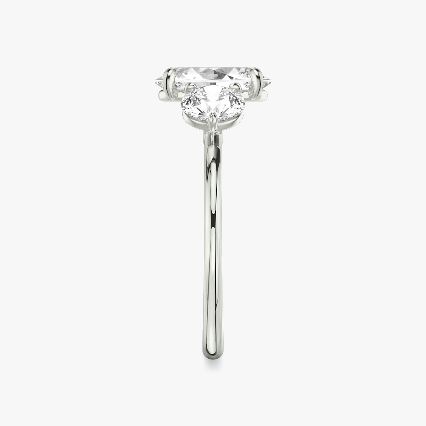 The Three Stone | Oval | Platinum | bandAccent: Plain | sideStoneCarat: 0.50ct | sideStoneShape: Round Brilliant | diamondOrientation: vertical | caratWeight: other