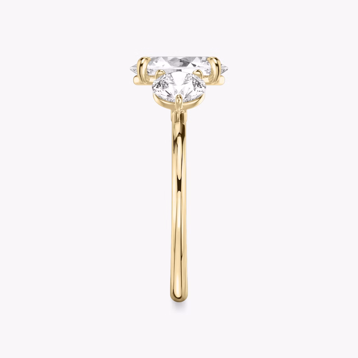 The Three Stone | Oval | 18k | Yellow Gold | bandAccent: Plain | sideStoneCarat: 0.50ct | sideStoneShape: Round Brilliant | diamondOrientation: vertical | caratWeight: other