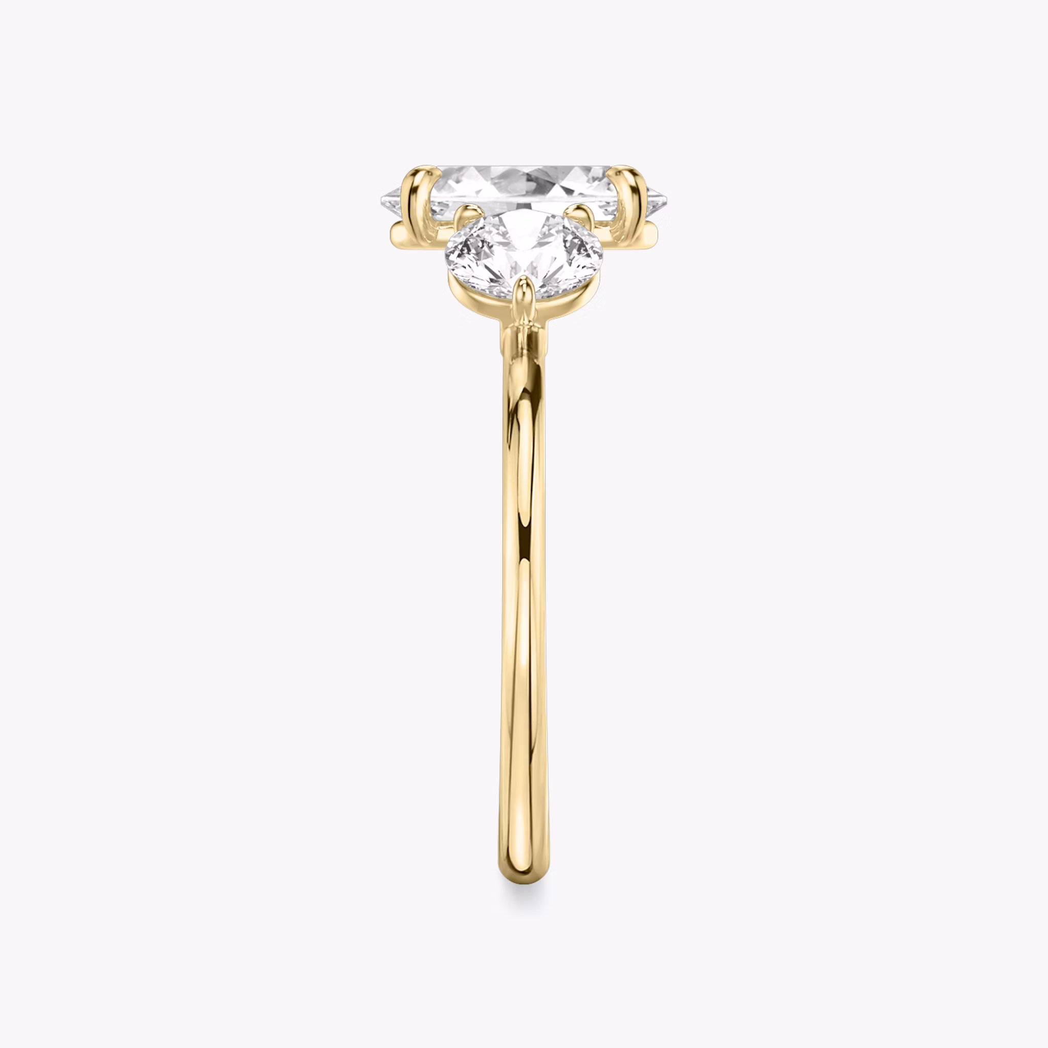 The Three Stone | Oval | 18k | Yellow Gold | bandAccent: Plain | sideStoneCarat: 0.50ct | sideStoneShape: Round Brilliant | diamondOrientation: vertical | caratWeight: other