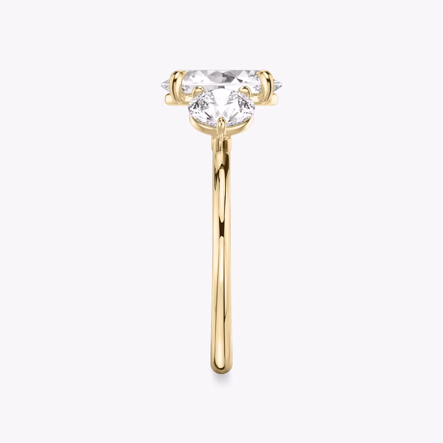 The Three Stone | Oval | 18k | Yellow Gold | bandAccent: Plain | sideStoneCarat: 0.50ct | sideStoneShape: Round Brilliant | diamondOrientation: vertical | caratWeight: other