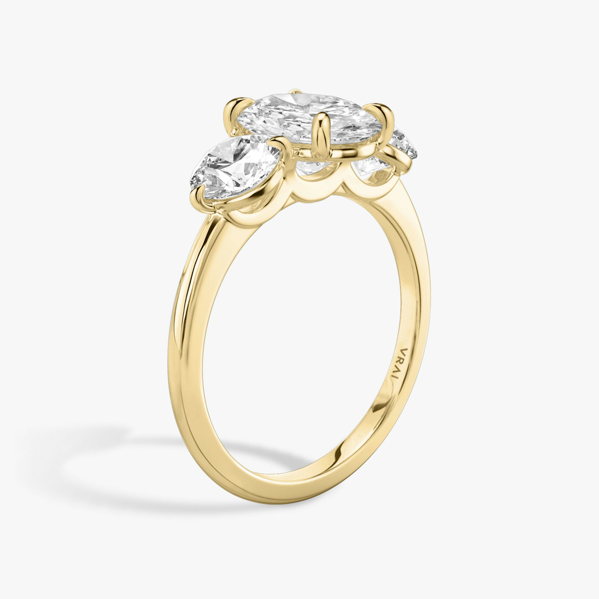 The Three Stone | Oval | 18k | Yellow Gold | bandAccent: Plain | sideStoneCarat: 0.50ct | sideStoneShape: Round Brilliant | diamondOrientation: vertical | caratWeight: other