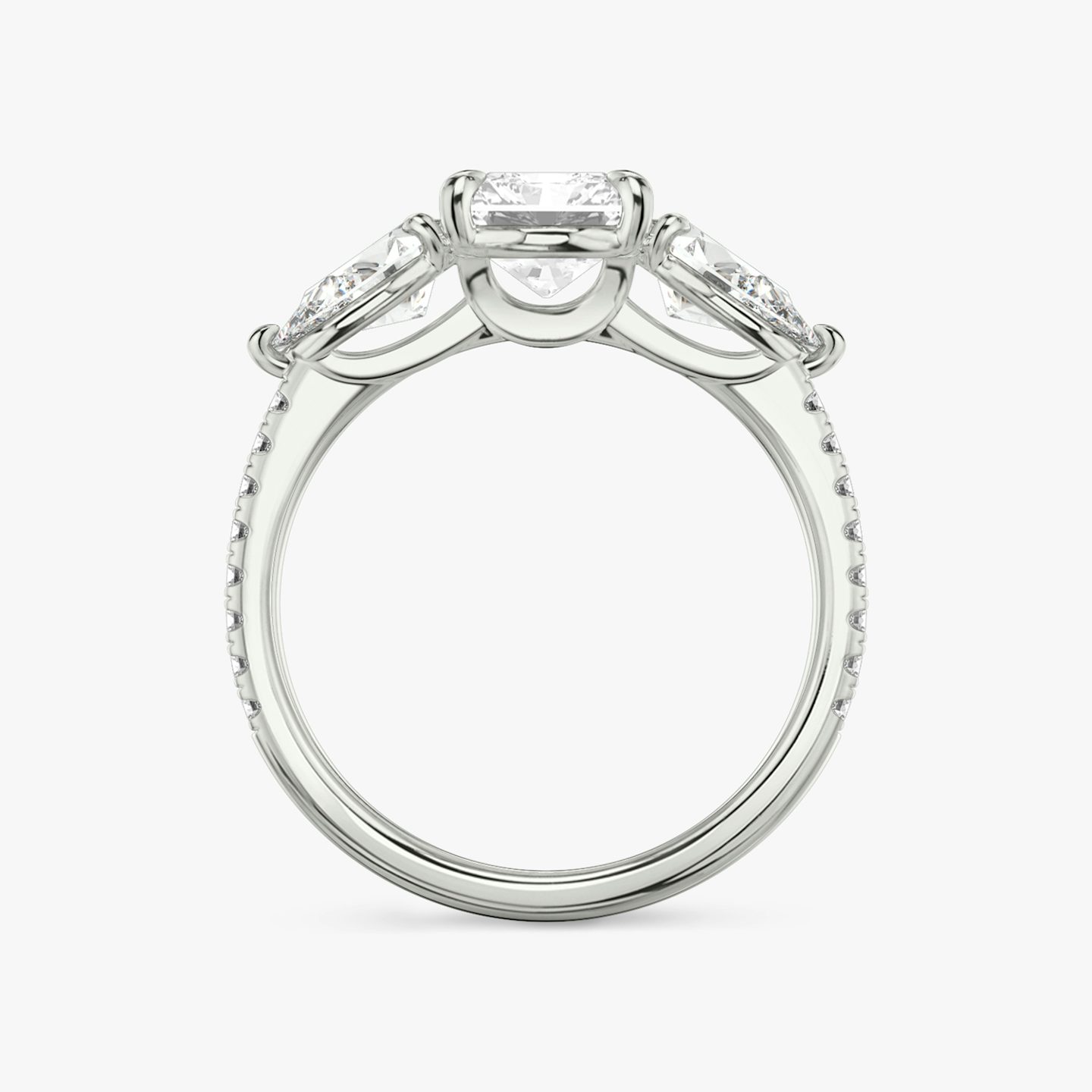 The Three Stone | Radiant | 18k | White Gold | bandAccent: Pavé | sideStoneCarat: 0.50ct | sideStoneShape: Pear | diamondOrientation: vertical | caratWeight: other