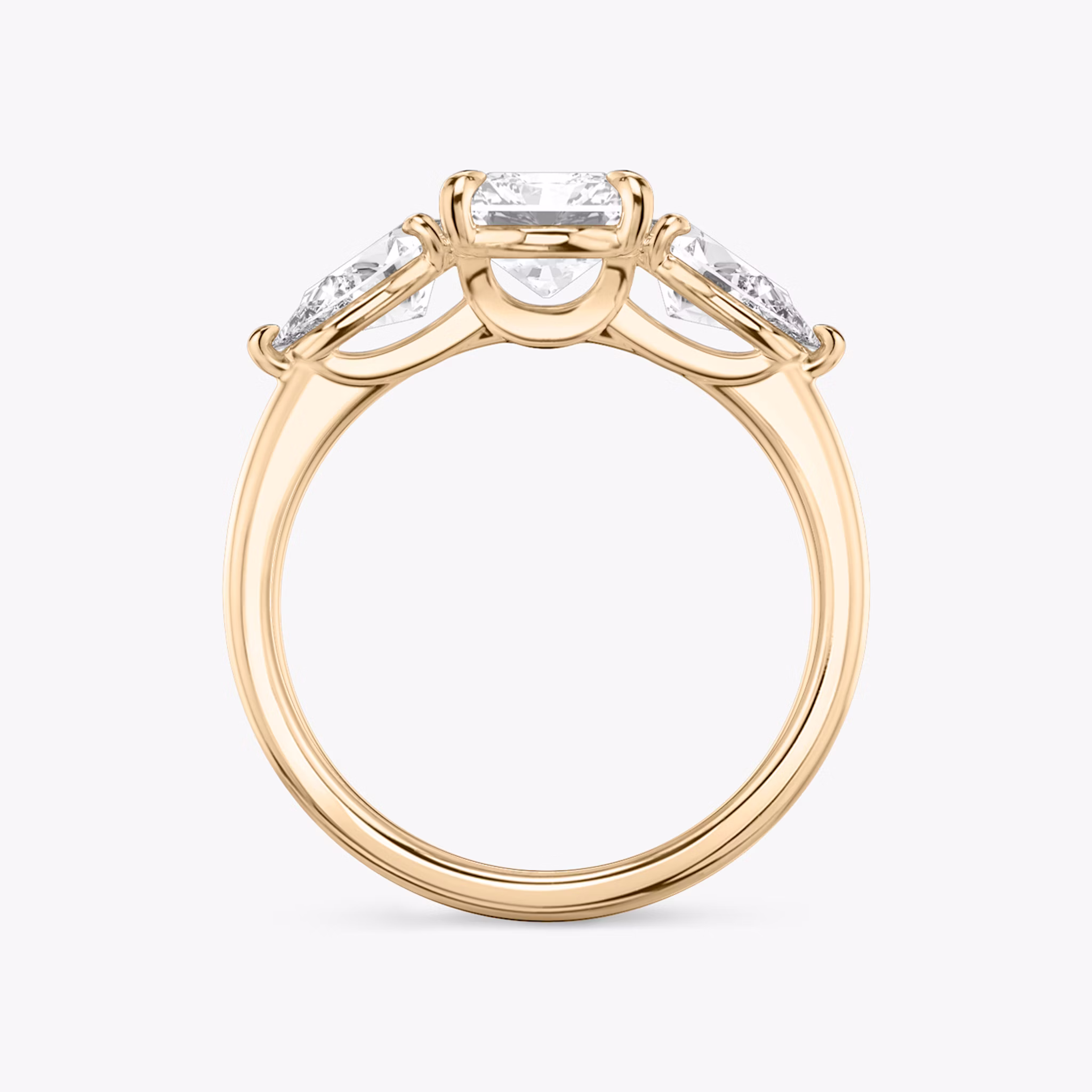 The Three Stone | Radiant | 14k | Rose Gold | bandAccent: Plain | sideStoneCarat: 0.50ct | sideStoneShape: Pear | diamondOrientation: vertical | caratWeight: other