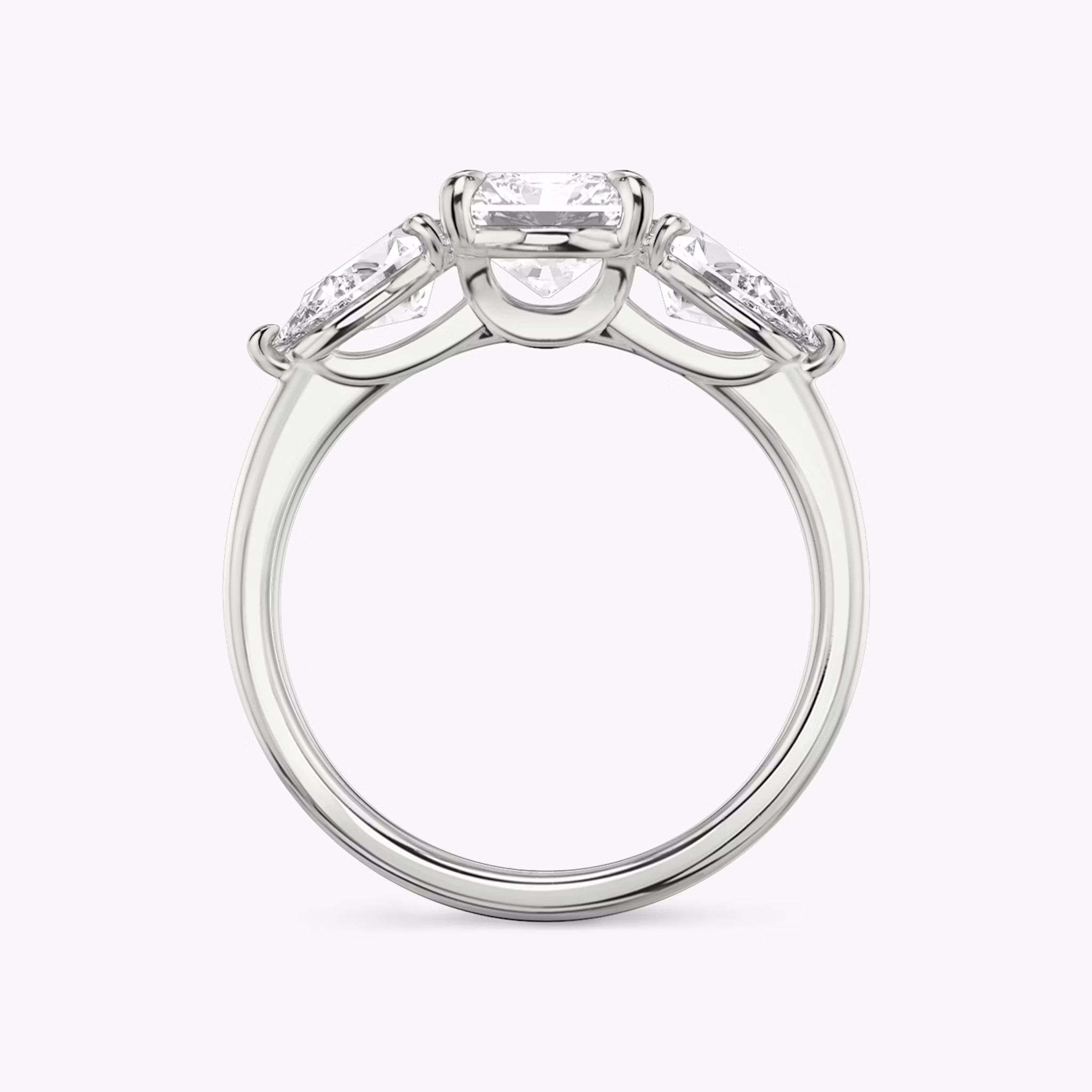 The Three Stone | Radiant | 18k | White Gold | bandAccent: Plain | sideStoneCarat: 0.50ct | sideStoneShape: Pear | diamondOrientation: vertical | caratWeight: other