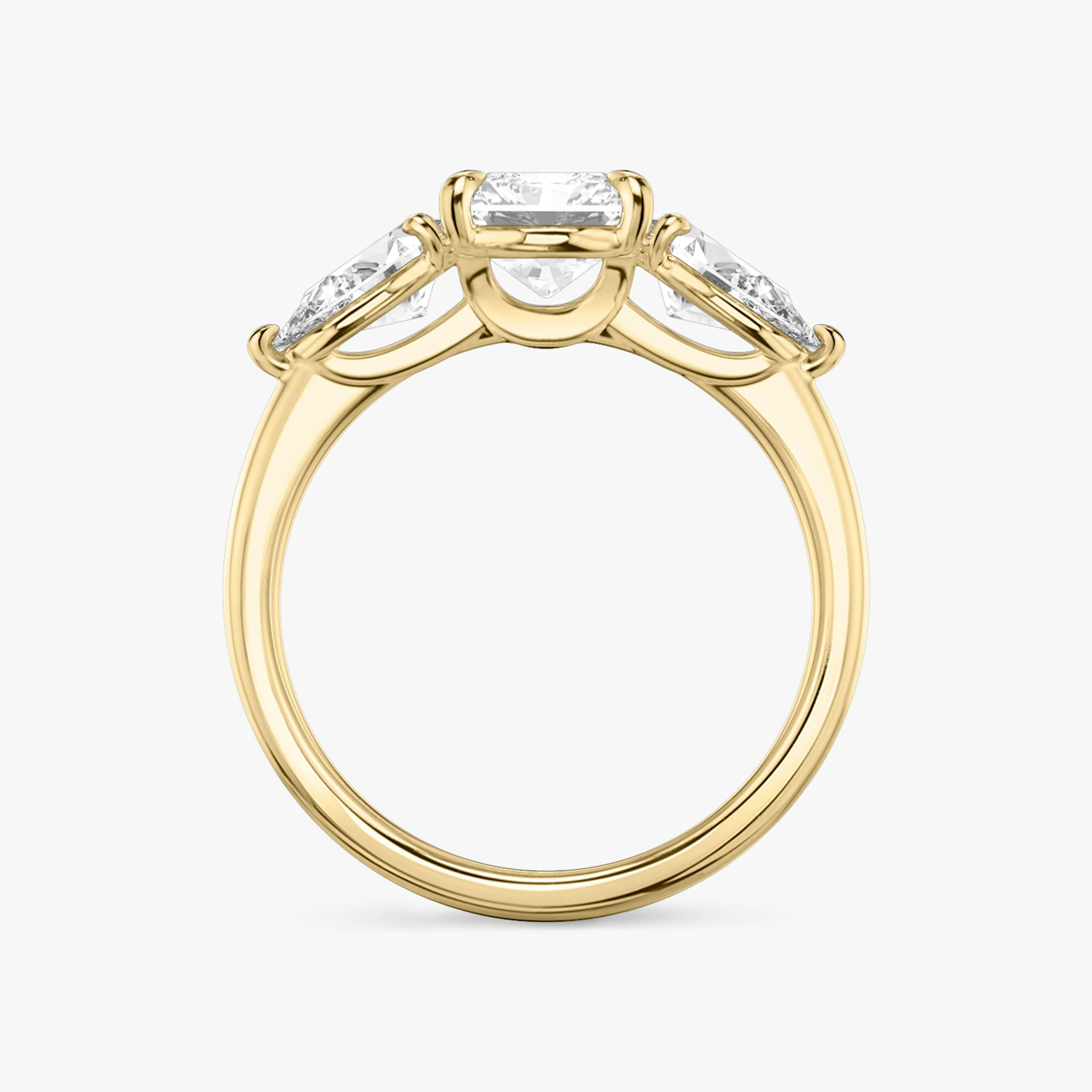 The Three Stone | Radiant | 18k | Yellow Gold | bandAccent: Plain | sideStoneCarat: 0.50ct | sideStoneShape: Pear | diamondOrientation: vertical | caratWeight: other