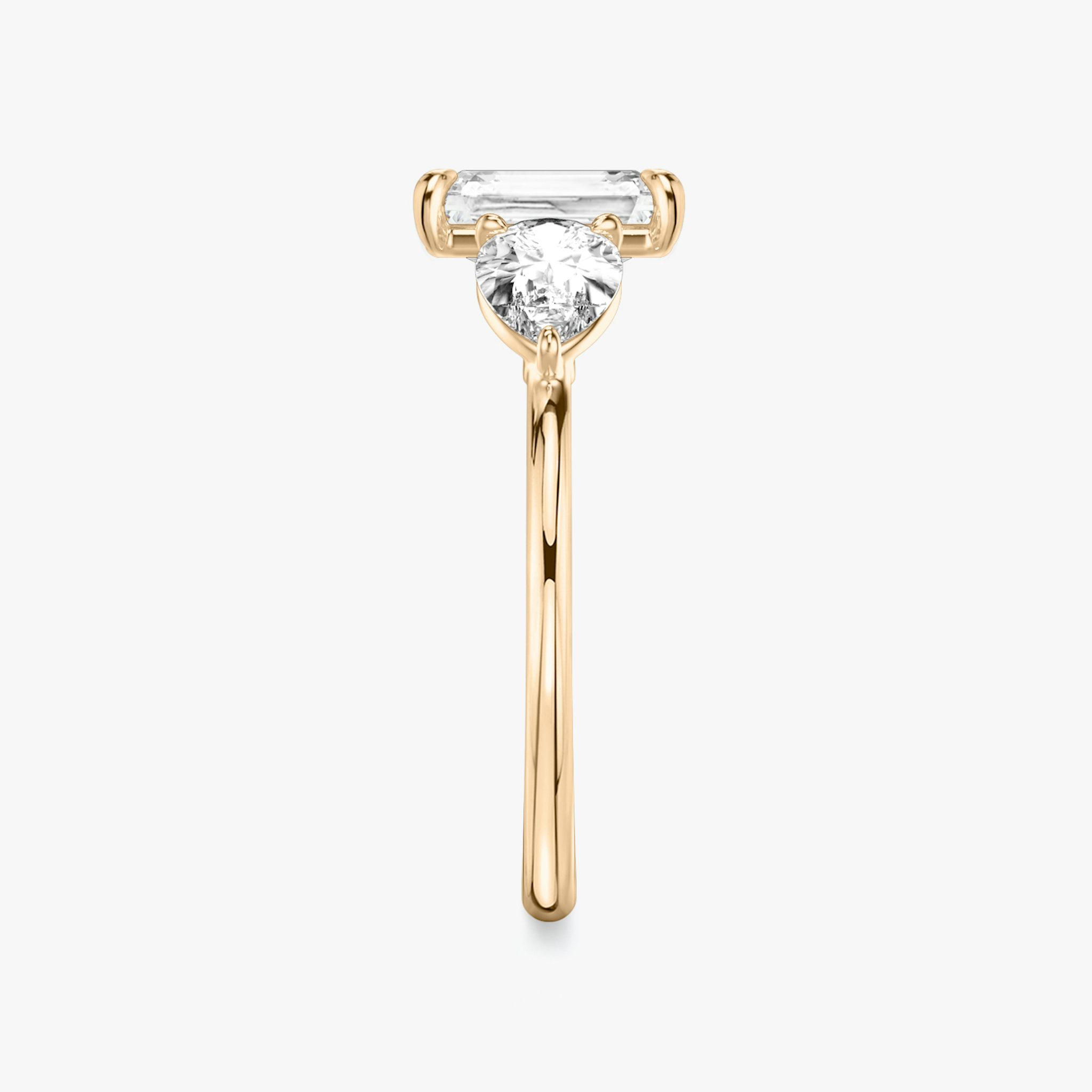 The Three Stone | Radiant | 14k | Rose Gold | bandAccent: Plain | sideStoneCarat: 0.50ct | sideStoneShape: Pear | diamondOrientation: vertical | caratWeight: other