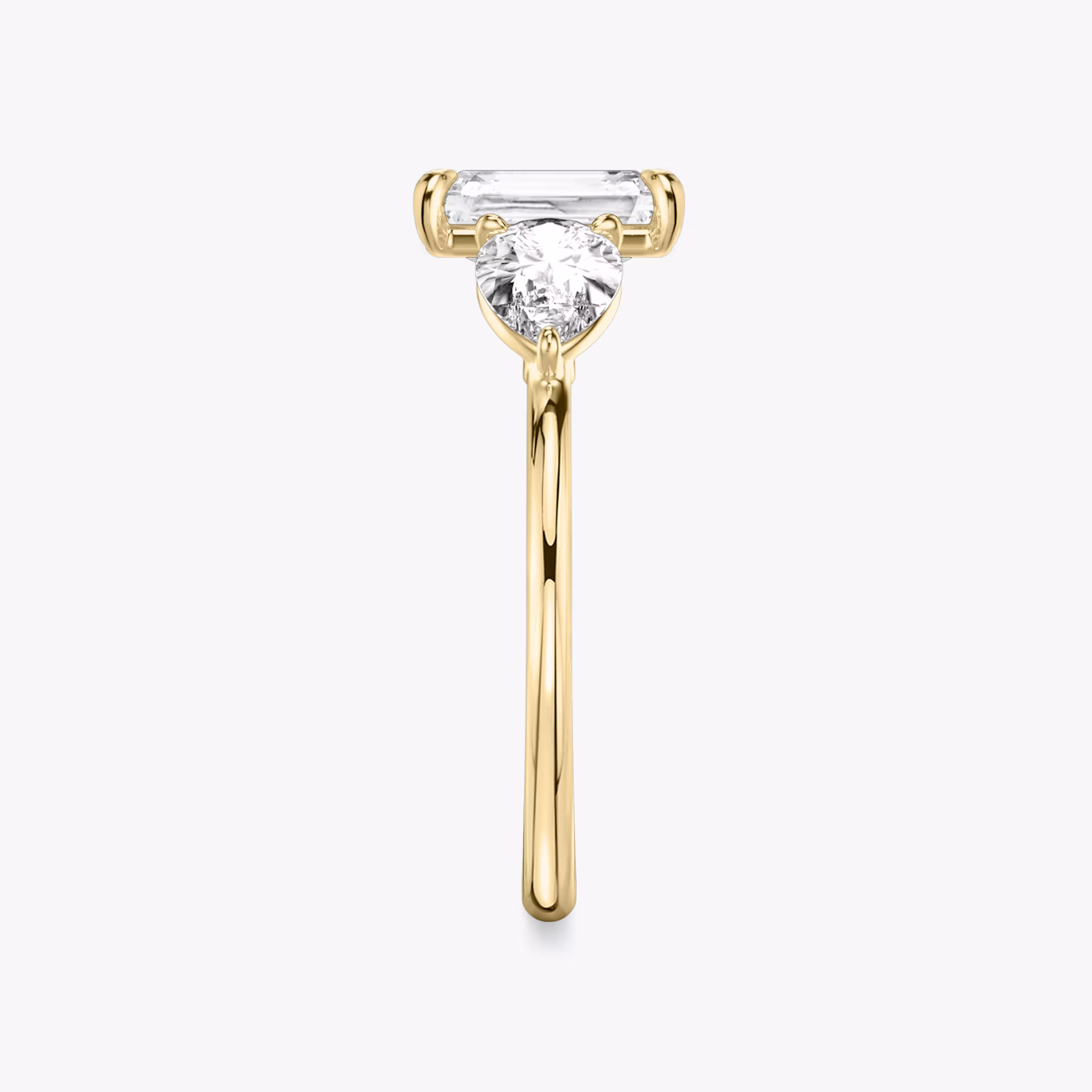 The Three Stone | Radiant | 18k | Yellow Gold | bandAccent: Plain | sideStoneCarat: 0.50ct | sideStoneShape: Pear | diamondOrientation: vertical | caratWeight: other