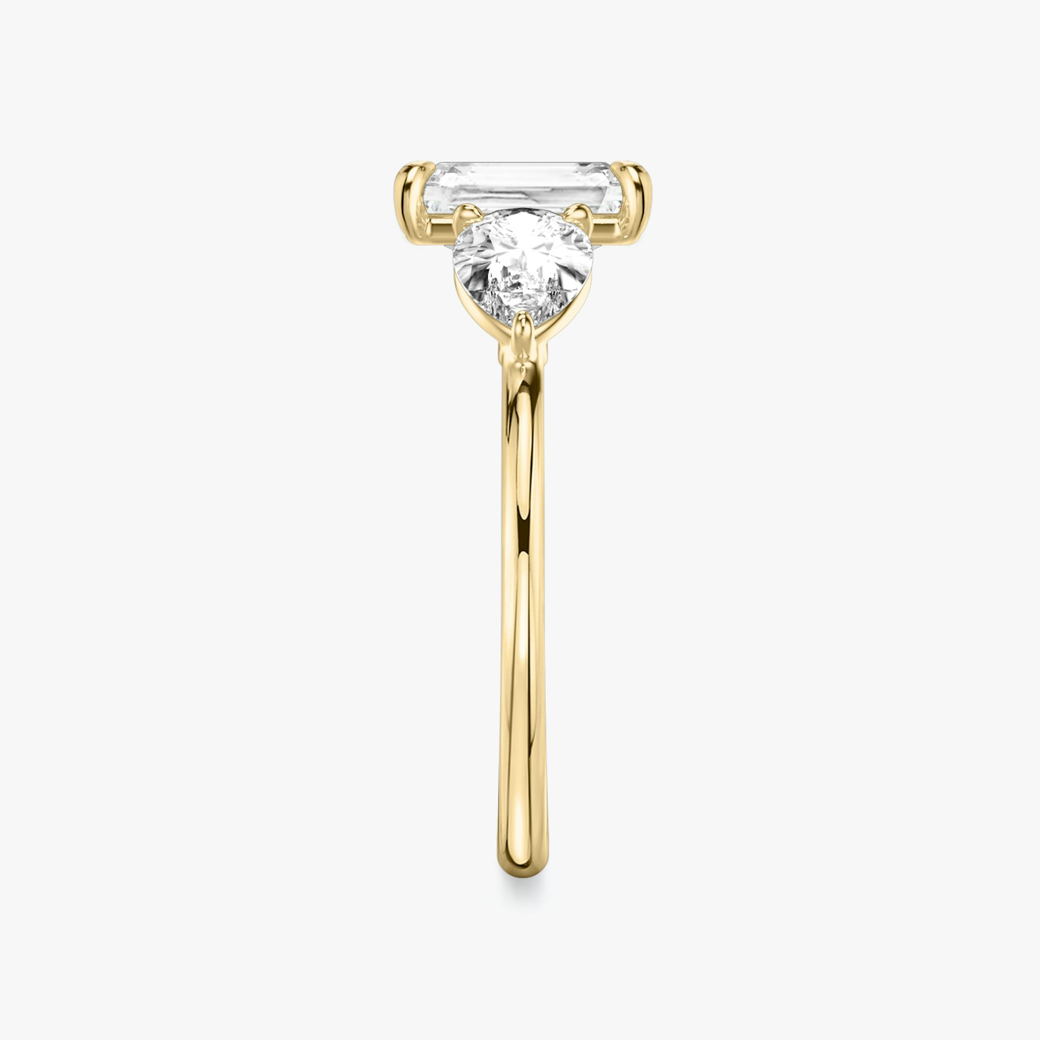 The Three Stone | Radiant | 18k | Yellow Gold | bandAccent: Plain | sideStoneCarat: 0.50ct | sideStoneShape: Pear | diamondOrientation: vertical | caratWeight: other