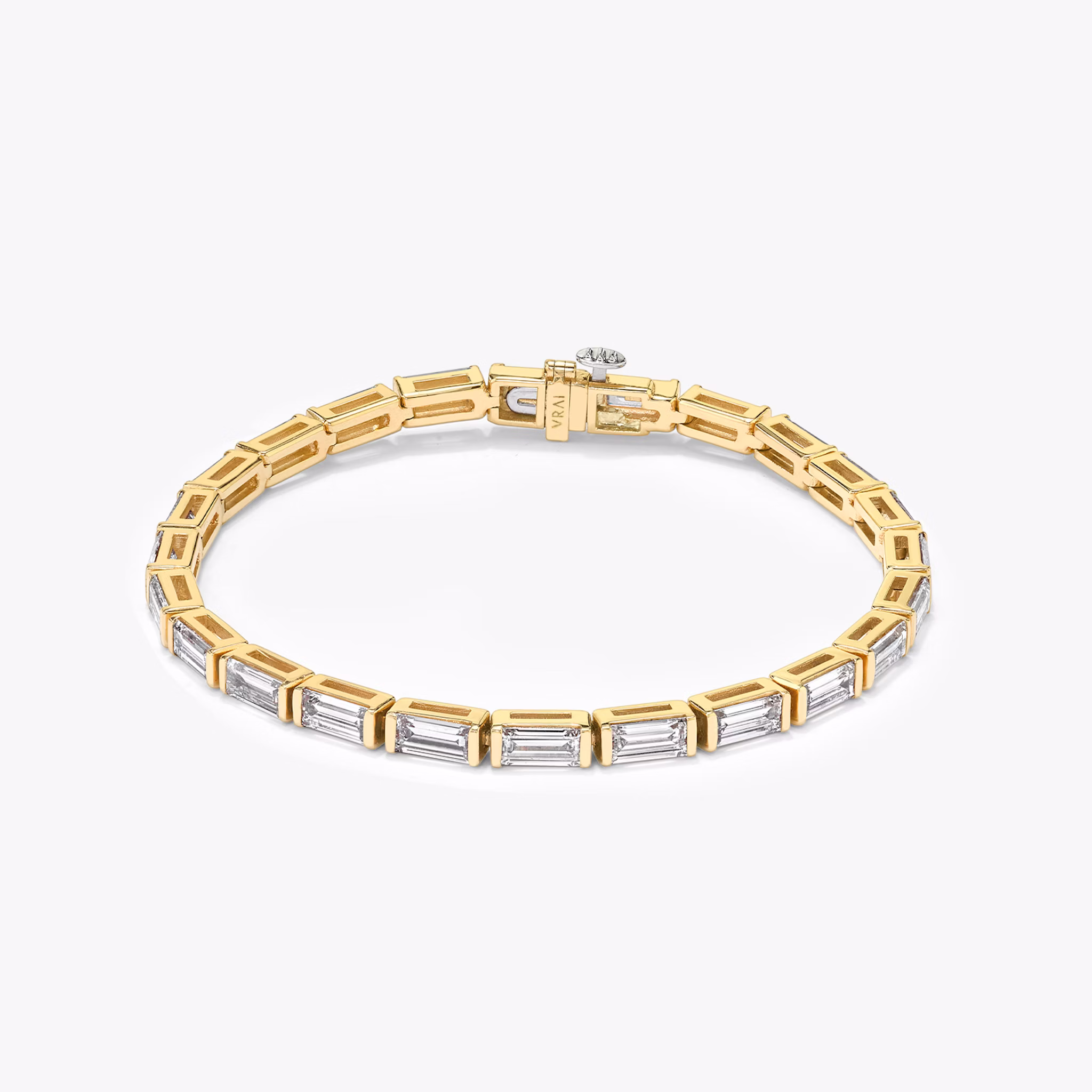 The Bezel Solitaire Bracelet in yellow gold.