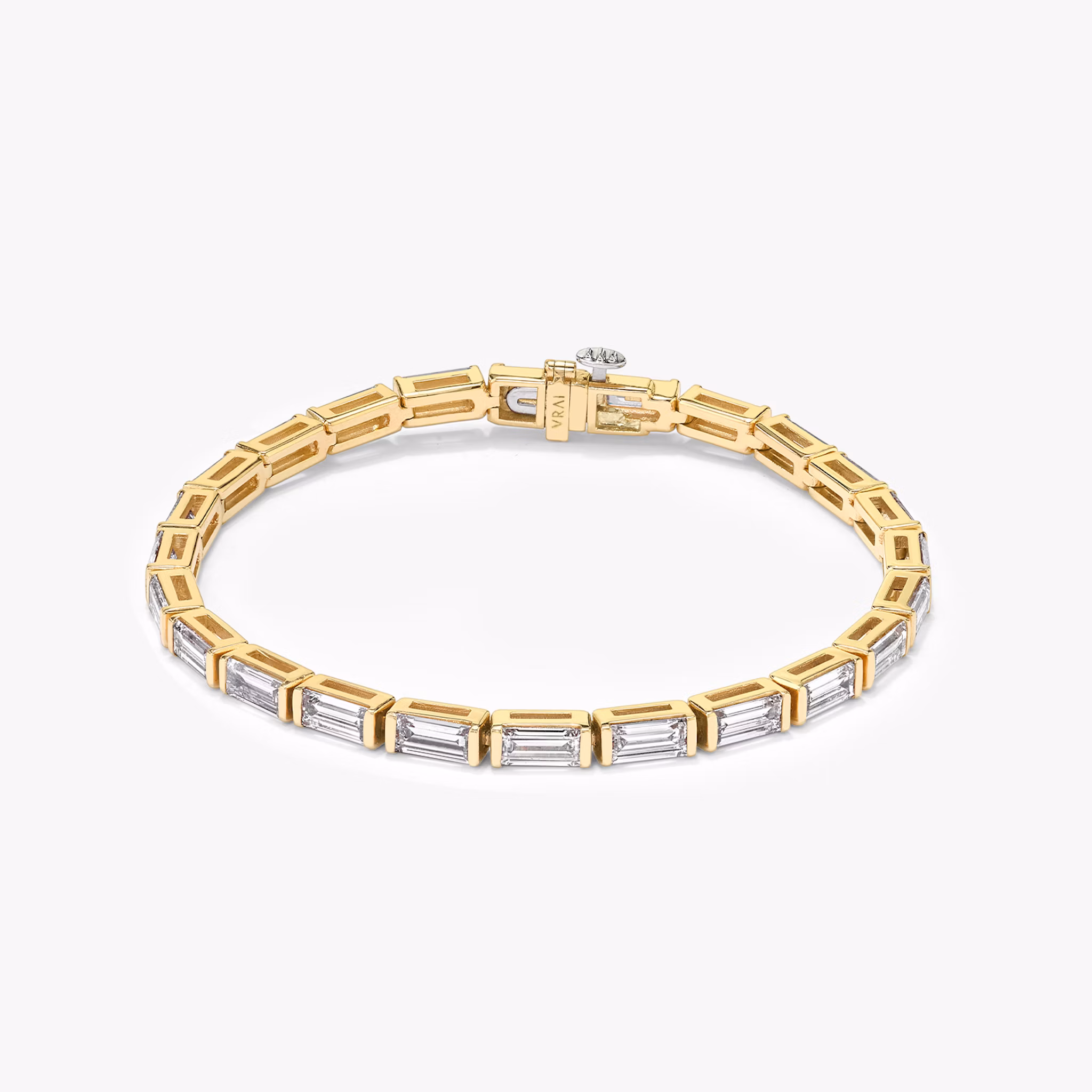 The Bezel Solitaire Bracelet in yellow gold.