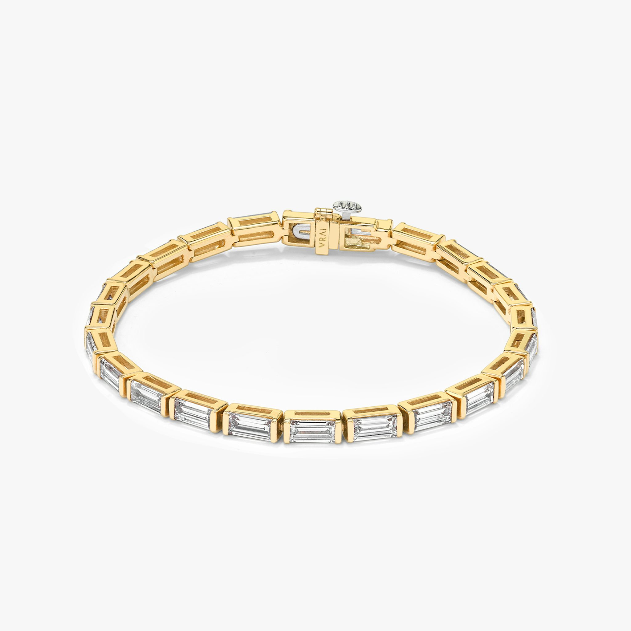 The Bezel Solitaire Bracelet in yellow gold.