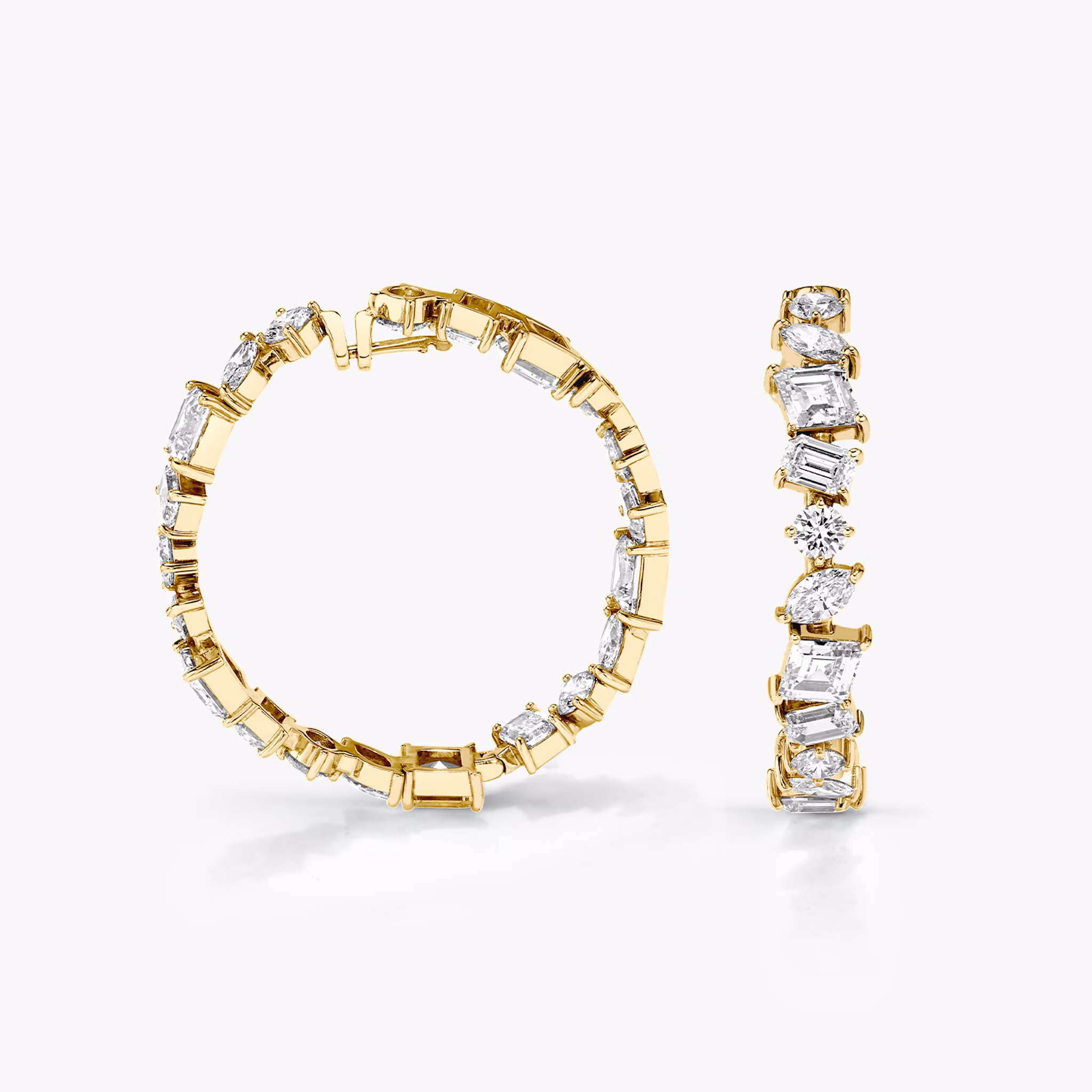 A pair of Illuminate Hoops in gold.