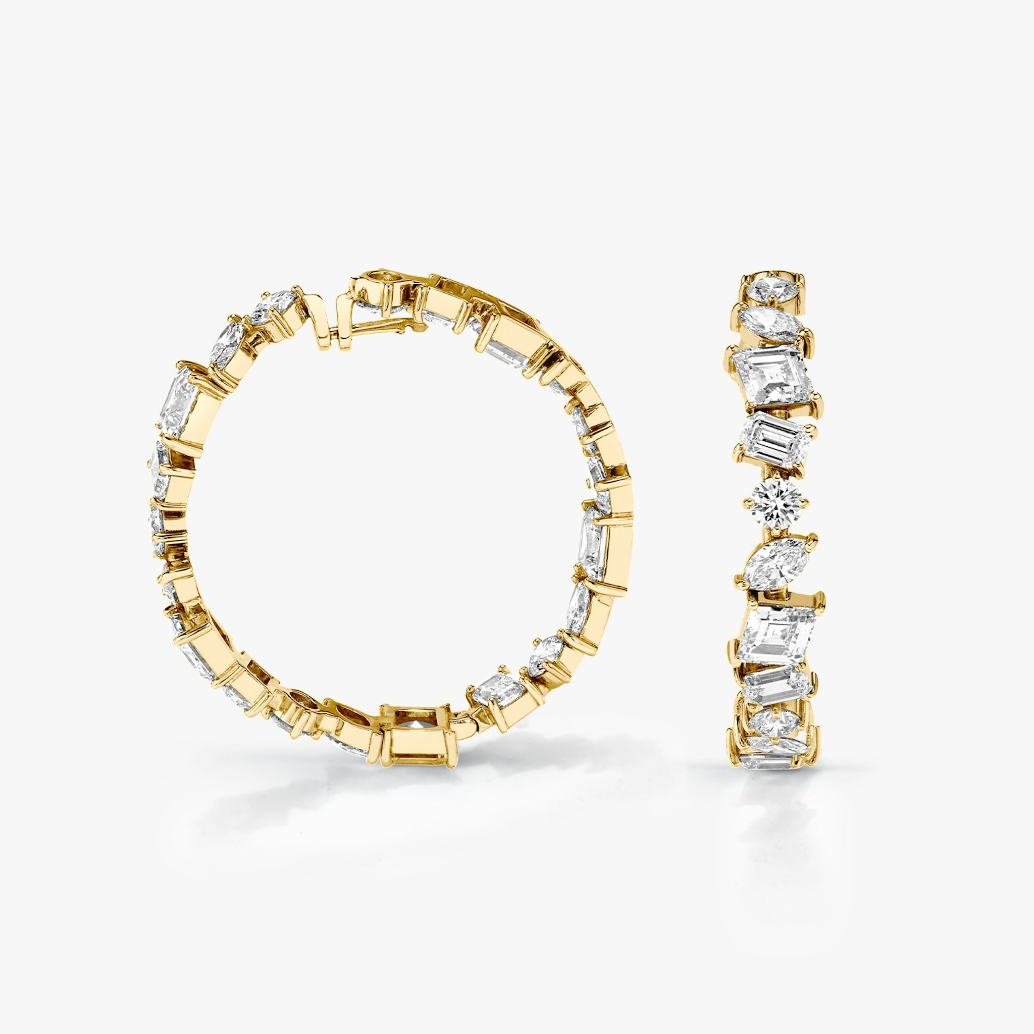 A pair of Illuminate Hoops in gold.