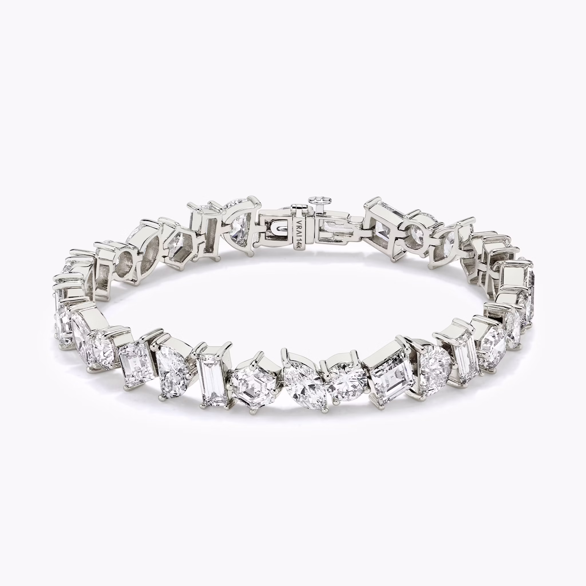 Illuminate Bracelet | baguette+lozenge+hexagon+marquise+round-brilliant+half-moon | 14k | White Gold | chainLength: 7