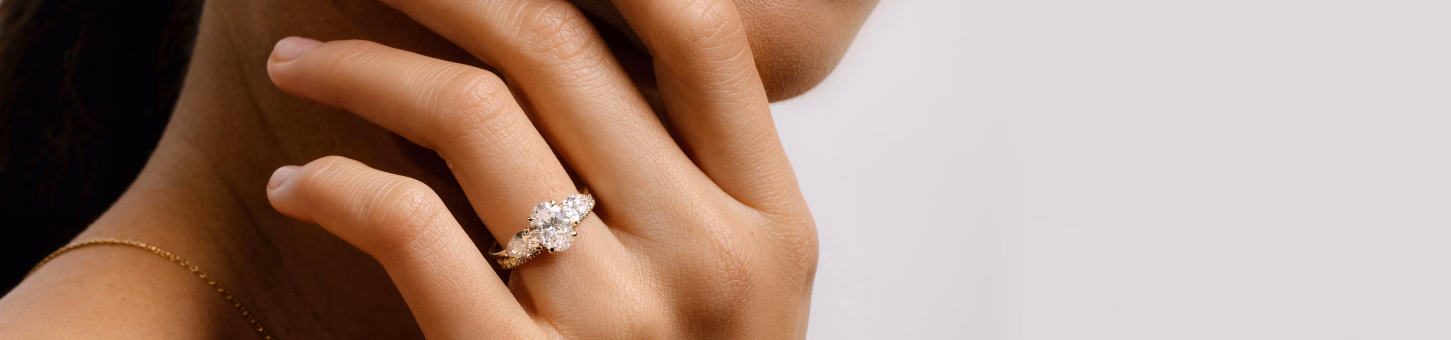 Oval Three Stone Engagement Ring with Pear sides
