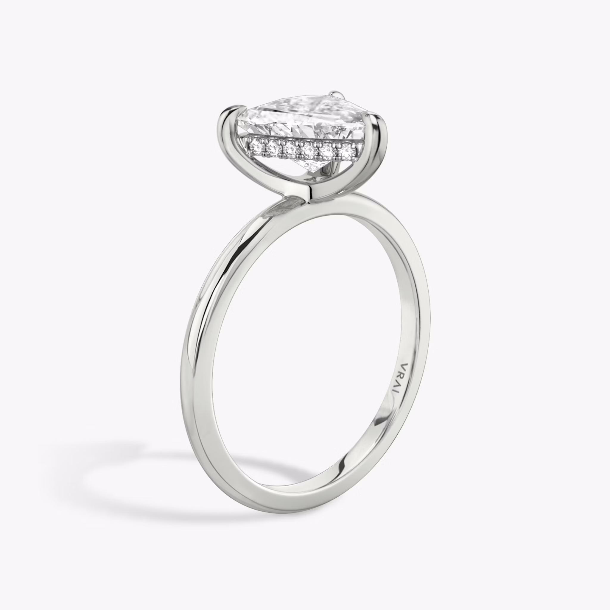 The Classic Hidden Halo | Trillion | Platinum | bandAccent: Plain | bandWidth: standard | prongStyle: Plain | diamondOrientation: vertical | caratWeight: other