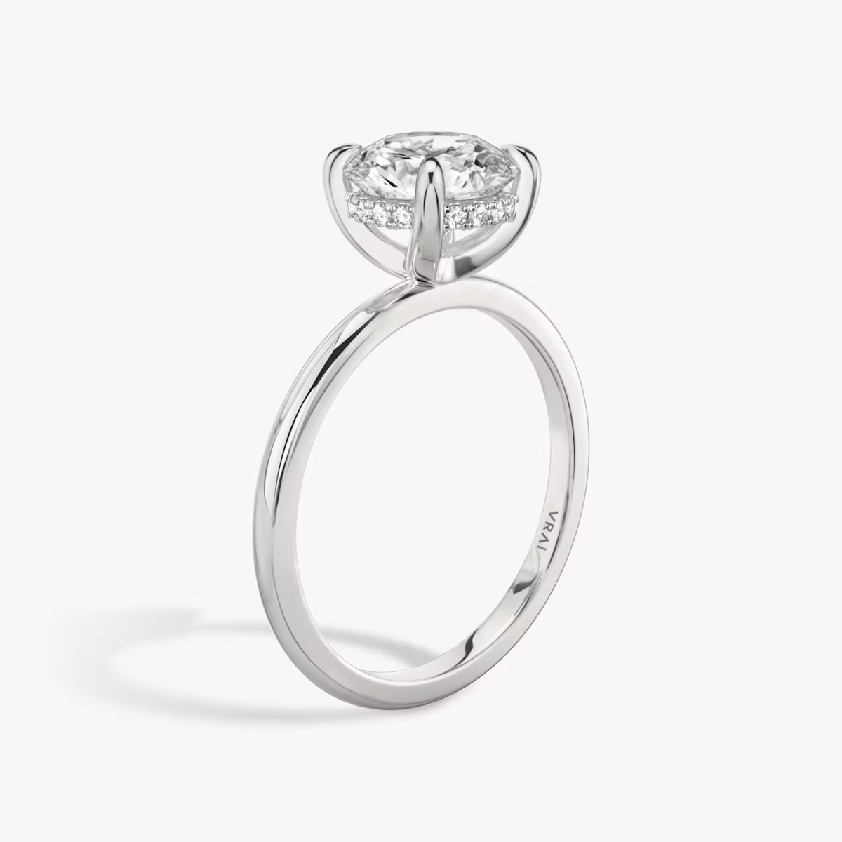 The Classic Hidden Halo | Round Brilliant | 18k | White Gold | bandAccent: Plain | bandWidth: standard | caratWeight: 1.5ct | prongStyle: Plain | diamondOrientation: vertical