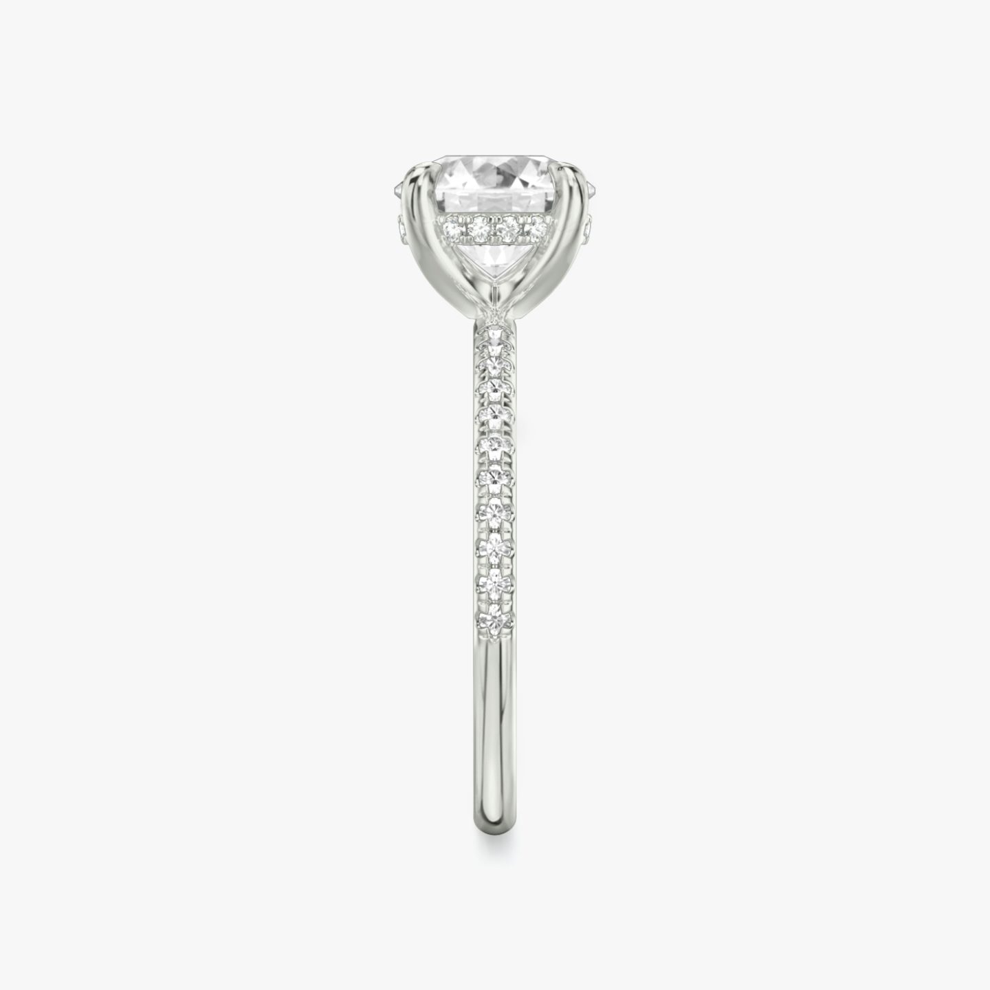 The Classic Hidden Halo | Round Brilliant | Platinum | bandAccent: Pavé | bandWidth: standard | caratWeight: other | prongStyle: Plain | diamondOrientation: vertical