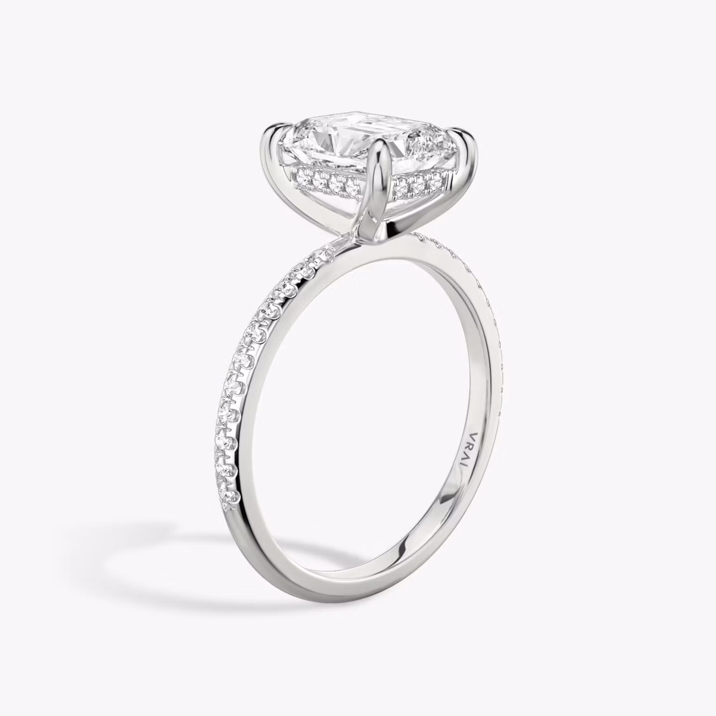 The Classic Hidden Halo | Radiant | Platinum | bandAccent: Pavé | bandWidth: standard | prongStyle: Plain | diamondOrientation: vertical | caratWeight: other
