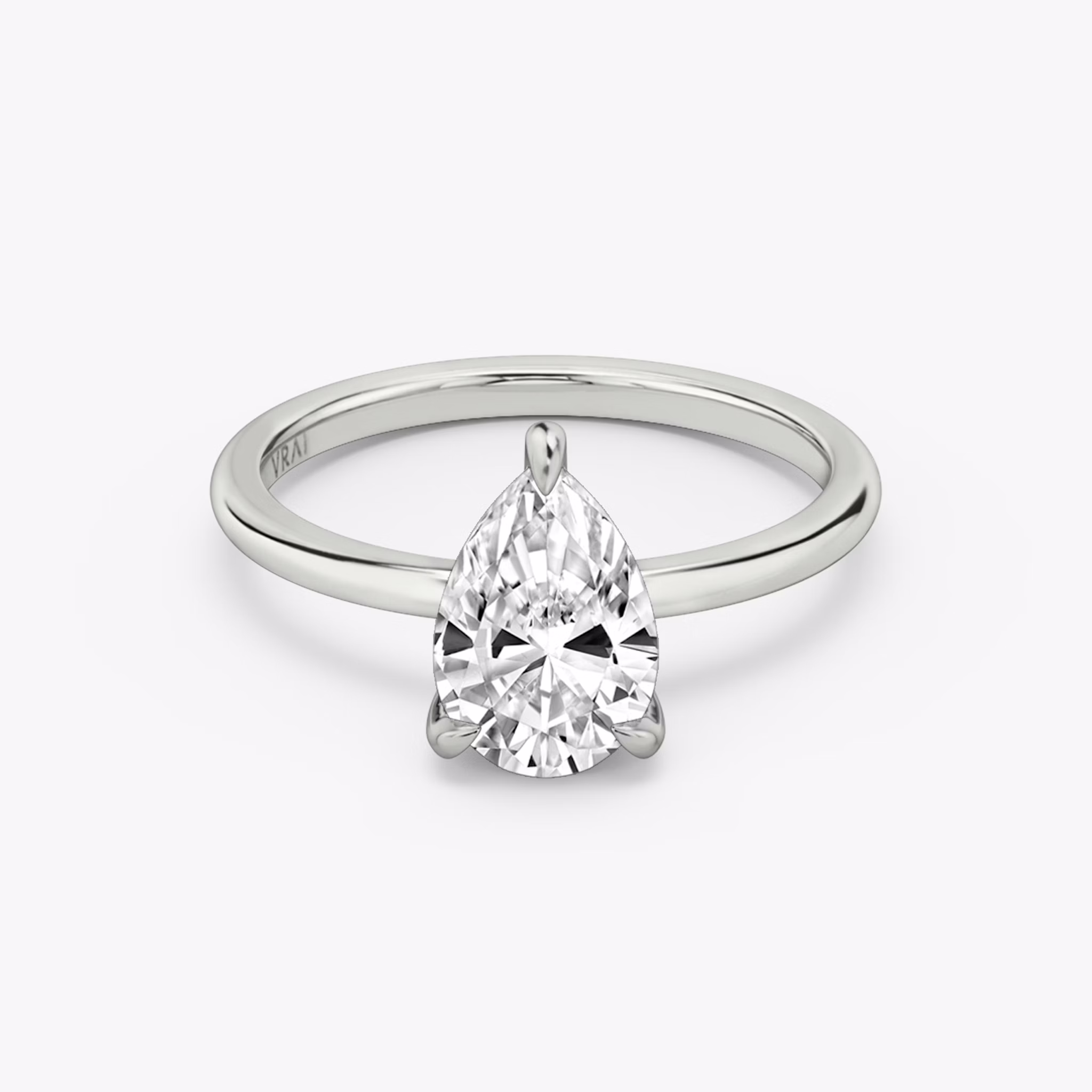 The Classic Hidden Halo | Pear | 18k | White Gold | bandAccent: Plain | bandWidth: standard | prongStyle: Plain | diamondOrientation: vertical | caratWeight: other