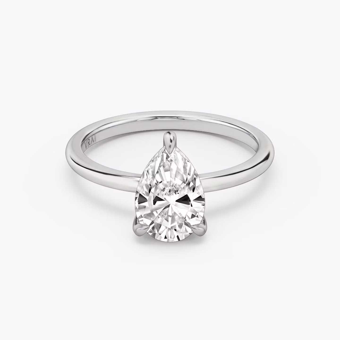 The Classic Hidden Halo | Pear | 18k | White Gold | bandAccent: Plain | bandWidth: standard | prongStyle: Plain | diamondOrientation: vertical | caratWeight: other