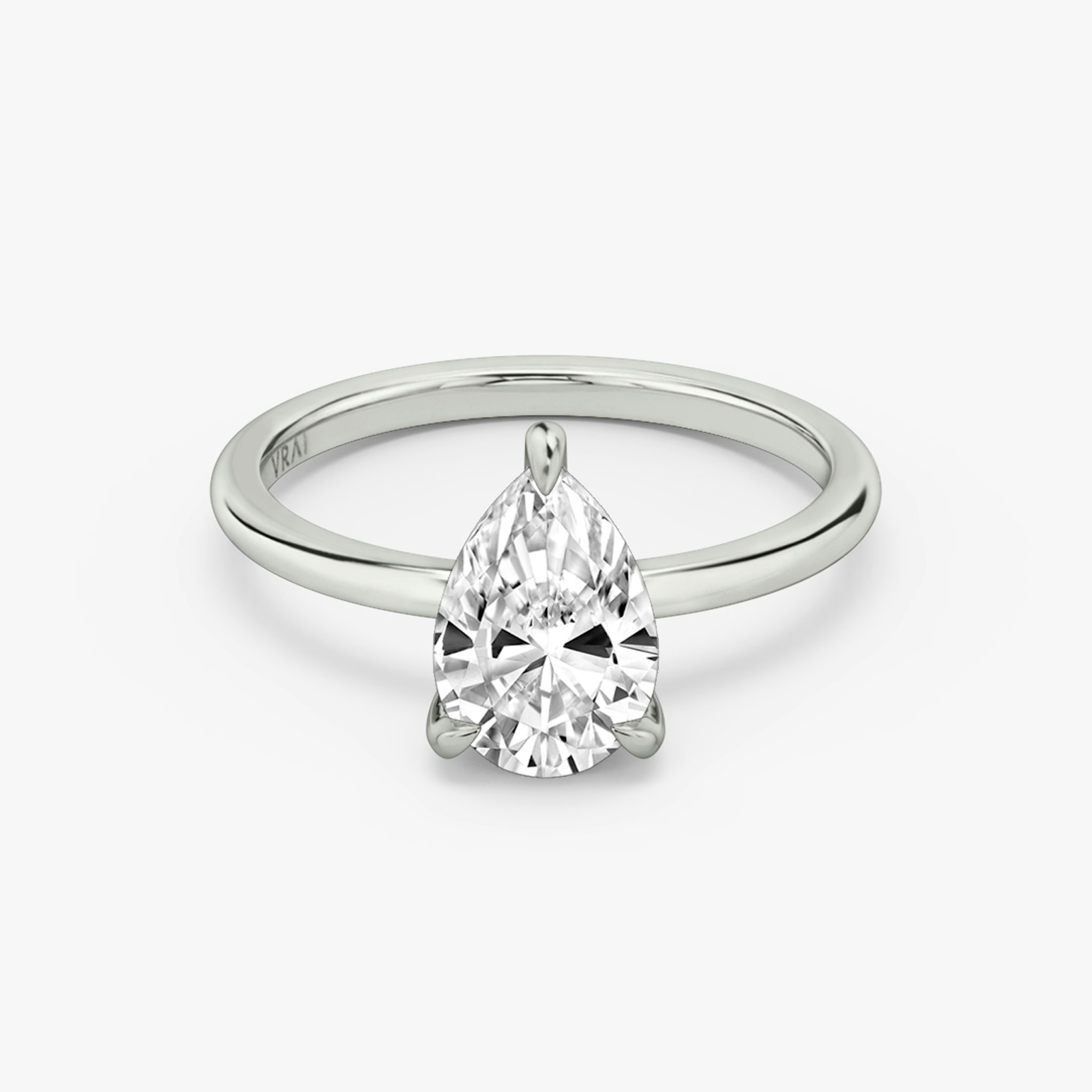 The Classic Hidden Halo | Pear | 18k | White Gold | bandAccent: Plain | bandWidth: standard | prongStyle: Plain | diamondOrientation: vertical | caratWeight: other