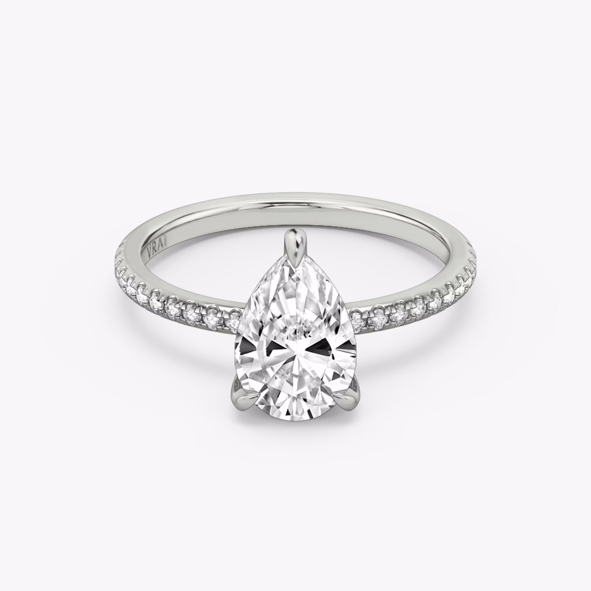 The Classic Hidden Halo | Pear | 18k | White Gold | bandAccent: Pavé | bandWidth: standard | prongStyle: Plain | diamondOrientation: vertical | caratWeight: other