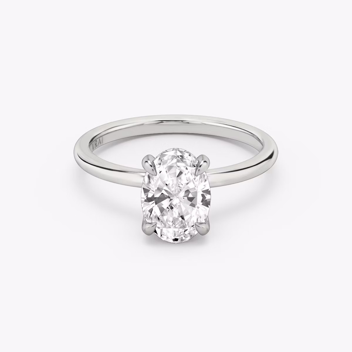 The Classic Hidden Halo | Oval | Platinum | bandAccent: Plain | bandWidth: standard | prongStyle: Plain | diamondOrientation: vertical | caratWeight: other