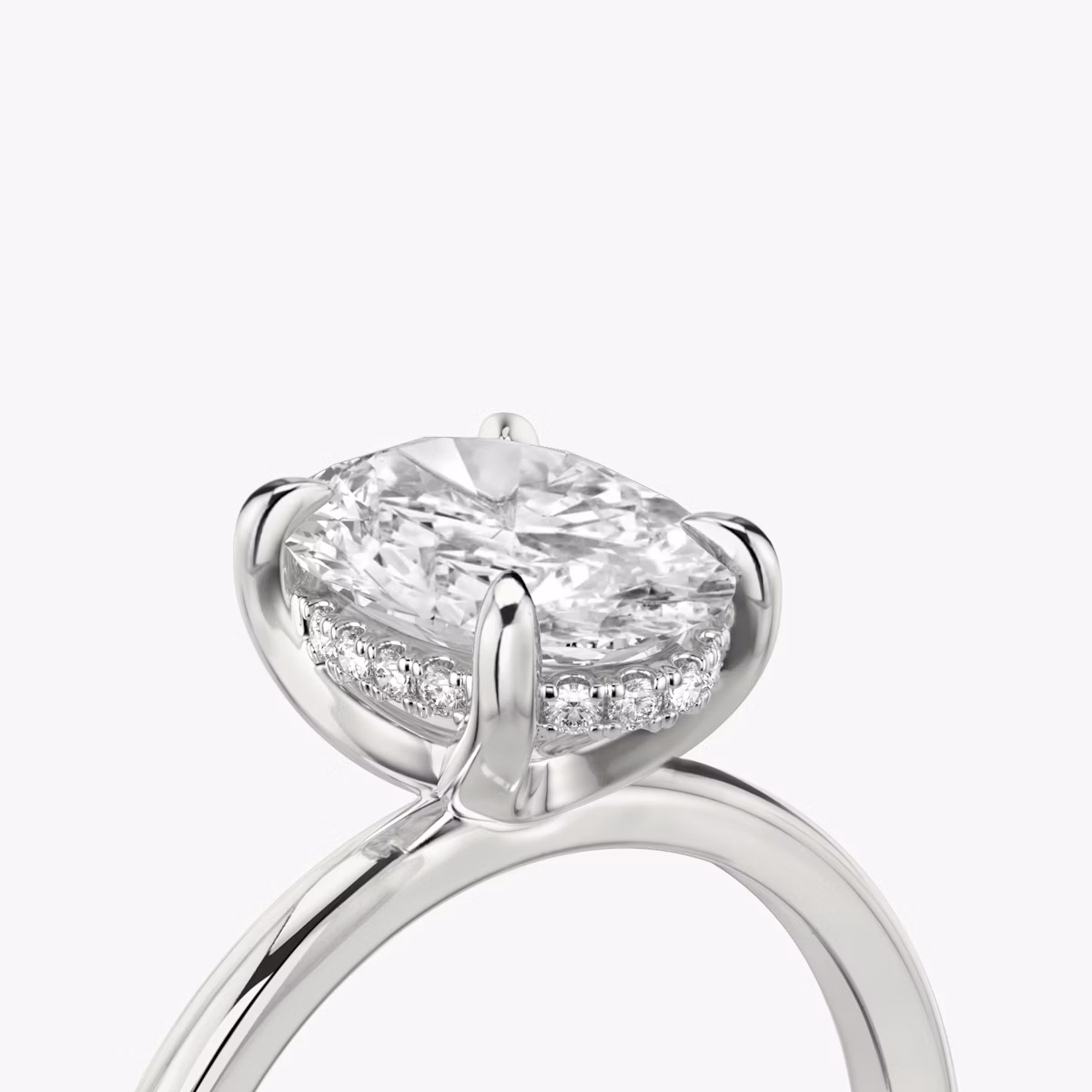 The Classic Hidden Halo | Oval | Platinum | bandAccent: Plain | bandWidth: standard | prongStyle: Plain | diamondOrientation: vertical | caratWeight: other