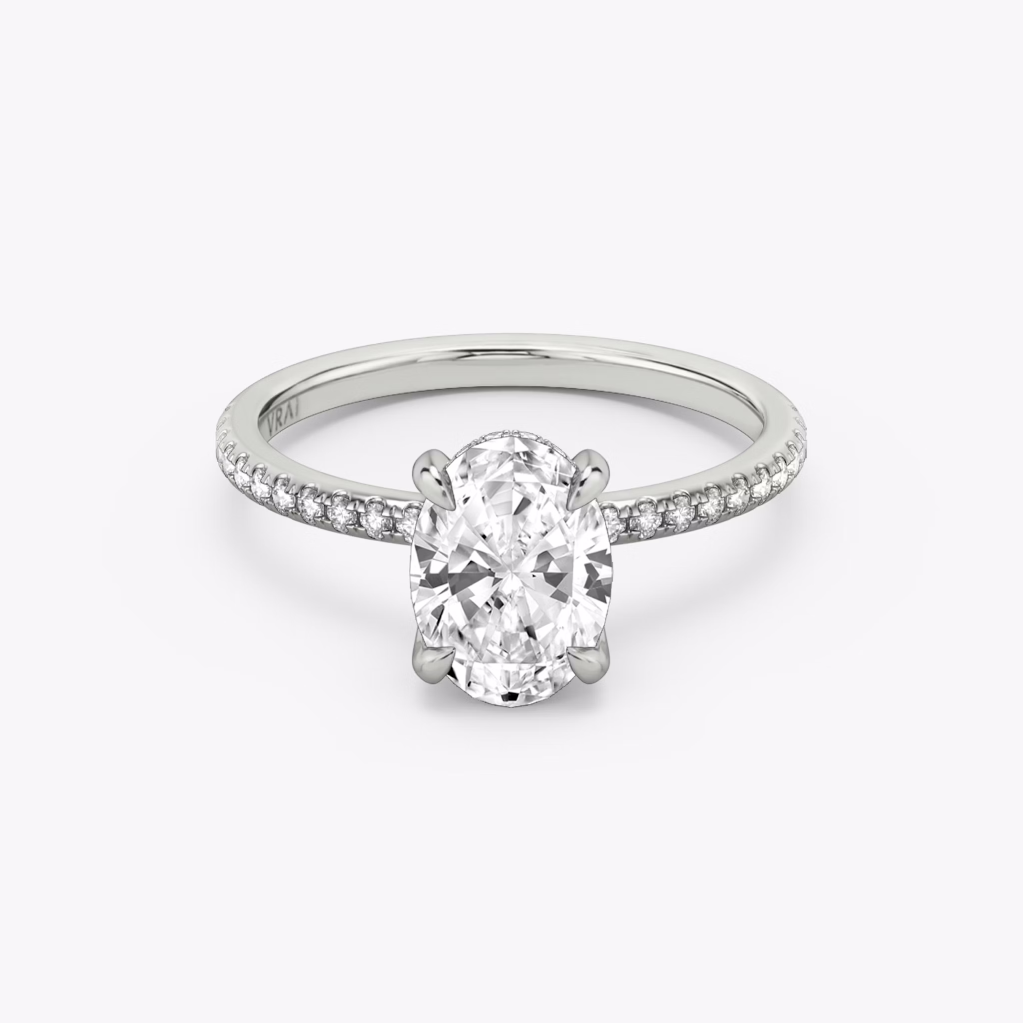 The Classic Hidden Halo | Oval | 18k | White Gold | bandAccent: Pavé | bandWidth: standard | prongStyle: Plain | diamondOrientation: vertical | caratWeight: other