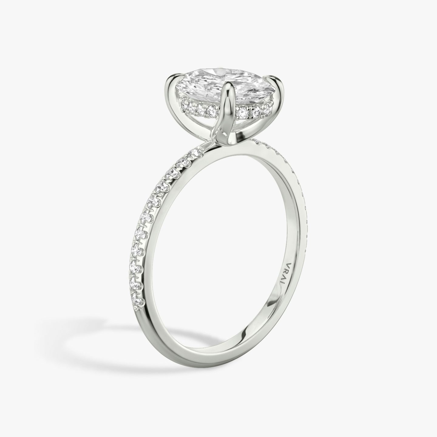 The Classic Hidden Halo | Oval | Platinum | bandAccent: Pavé | bandWidth: standard | prongStyle: Plain | diamondOrientation: vertical | caratWeight: other