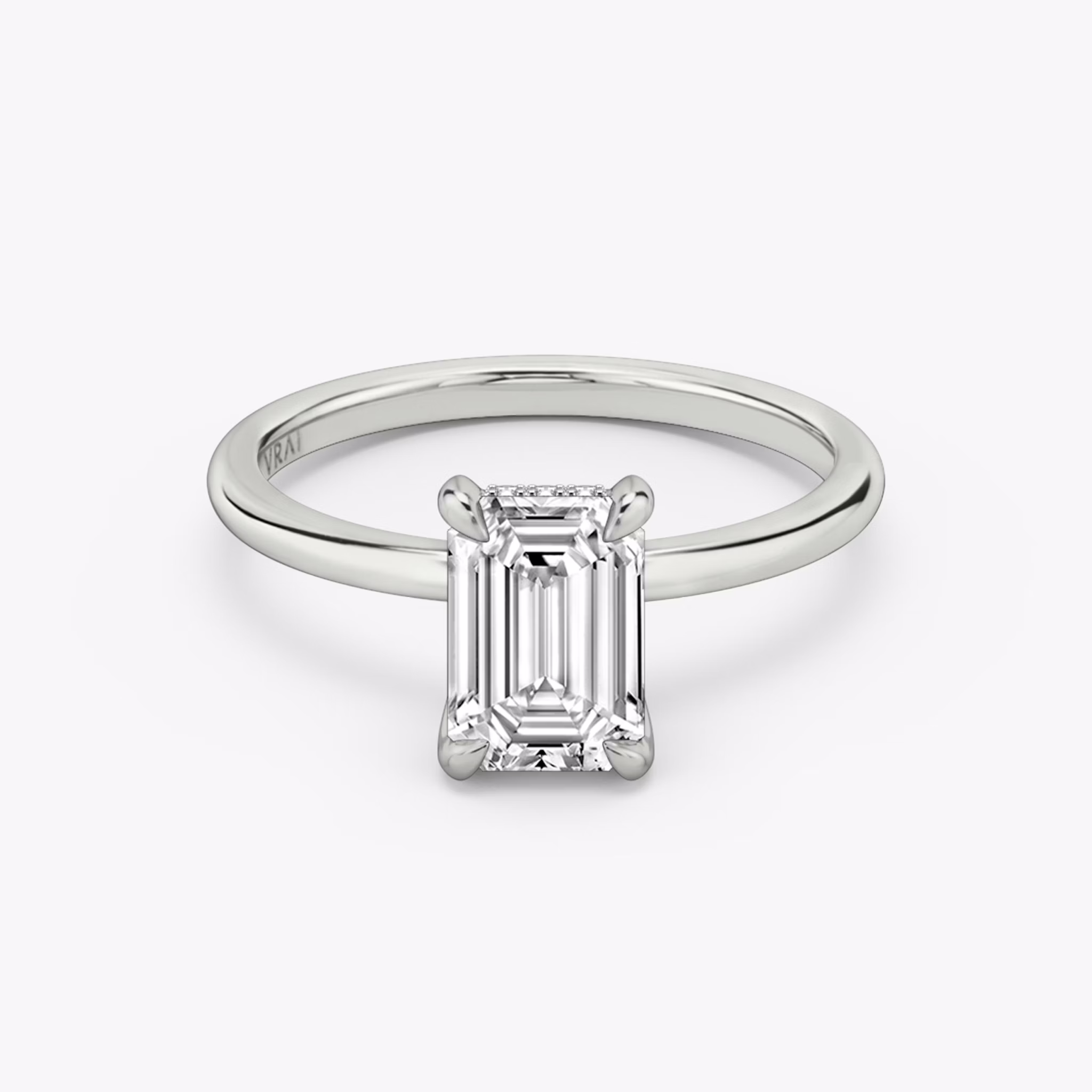 The Classic Hidden Halo | Emerald | 18k | White Gold | bandAccent: Plain | bandWidth: standard | prongStyle: Plain | diamondOrientation: vertical | caratWeight: other