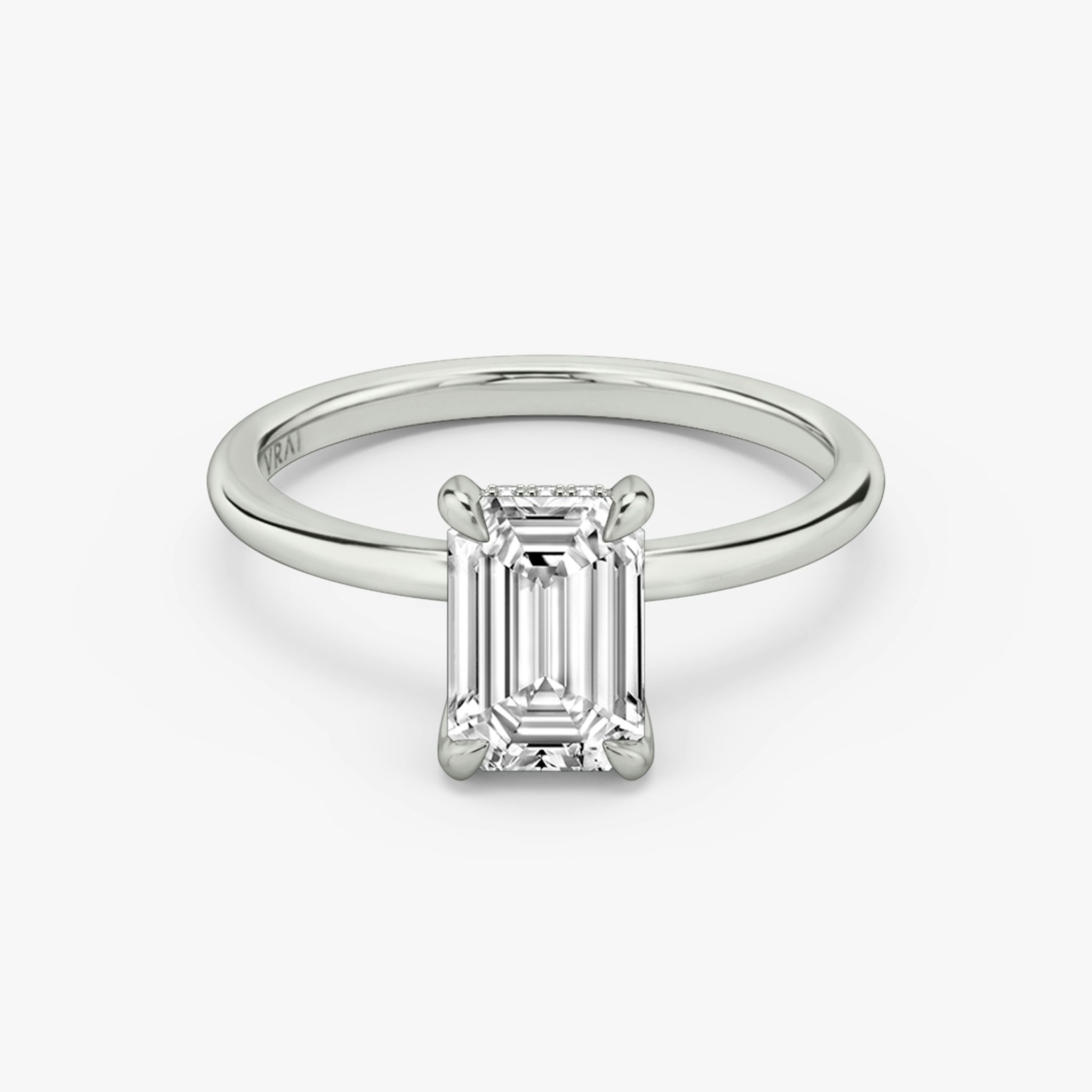 The Classic Hidden Halo | Emerald | 18k | White Gold | bandAccent: Plain | bandWidth: standard | prongStyle: Plain | diamondOrientation: vertical | caratWeight: other