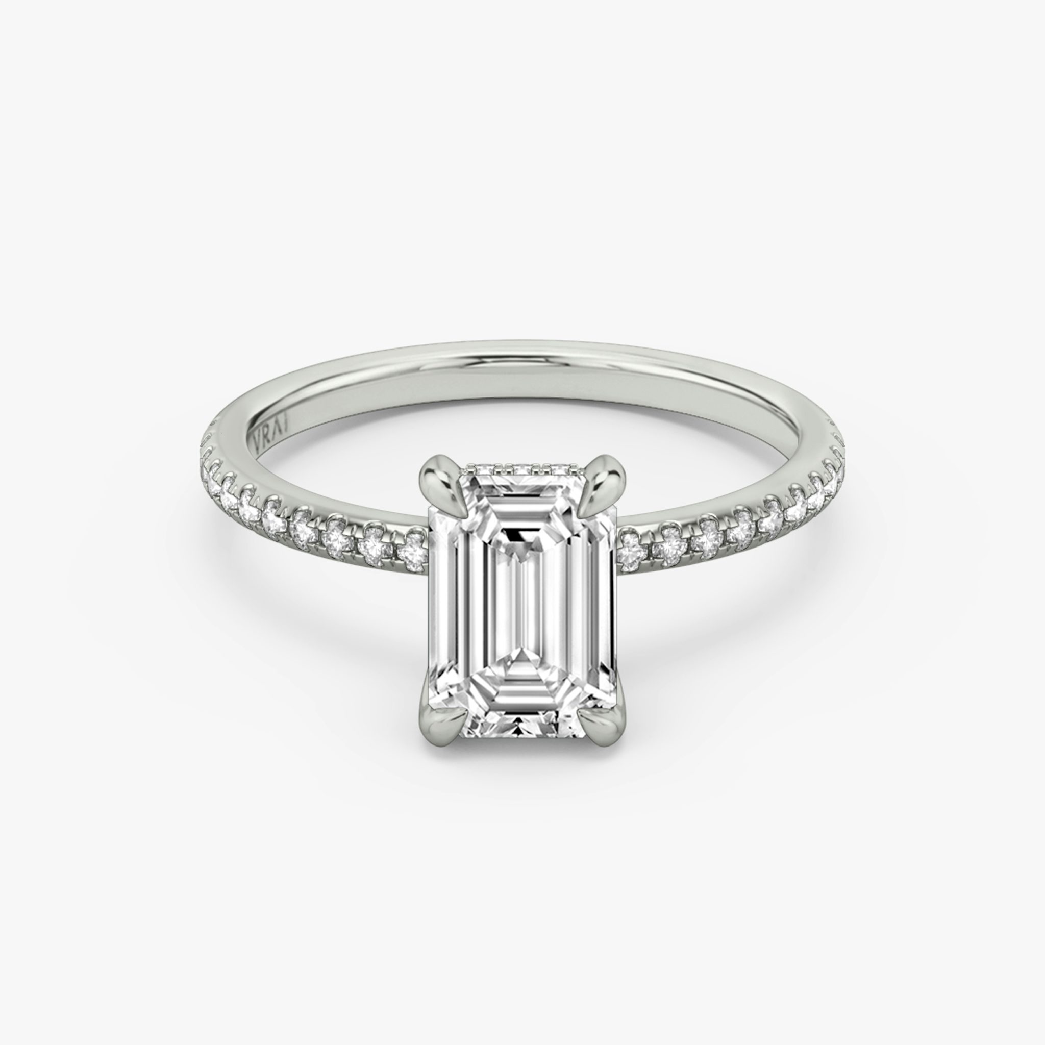 The Classic Hidden Halo | Emerald | 18k | White Gold | bandAccent: Pavé | bandWidth: standard | prongStyle: Plain | diamondOrientation: vertical | caratWeight: other